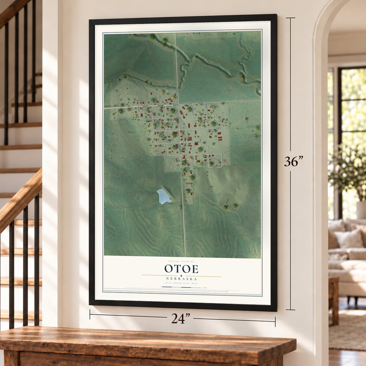 Otoe, Nebraska map, 24 x 36 inch print in a black frame by a staircase