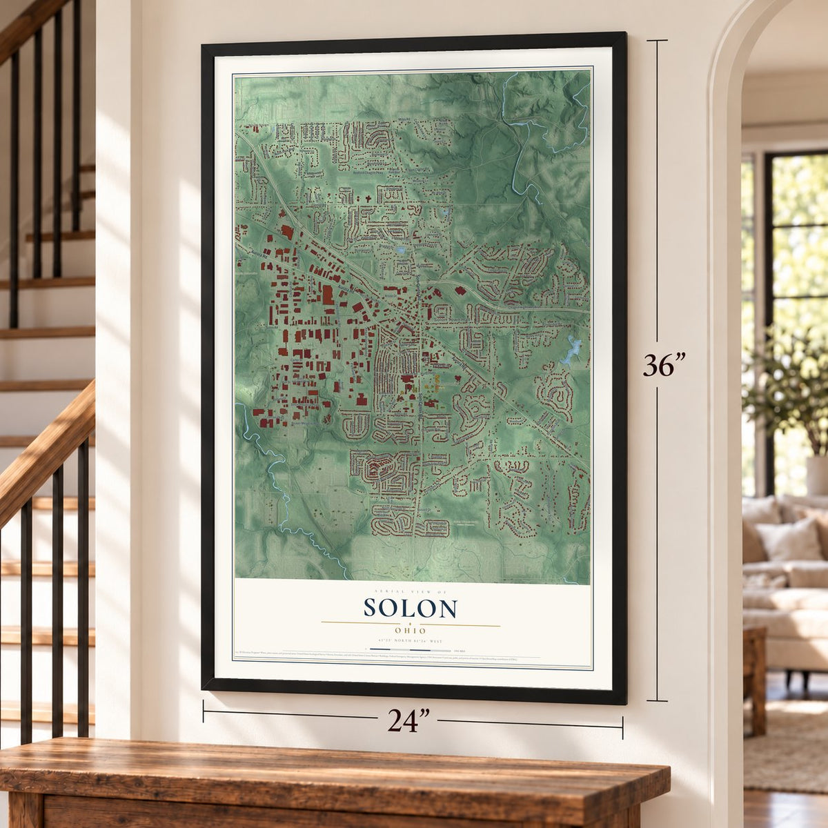 Solon, Ohio map, 24 x 36 inch print in a black frame by a staircase