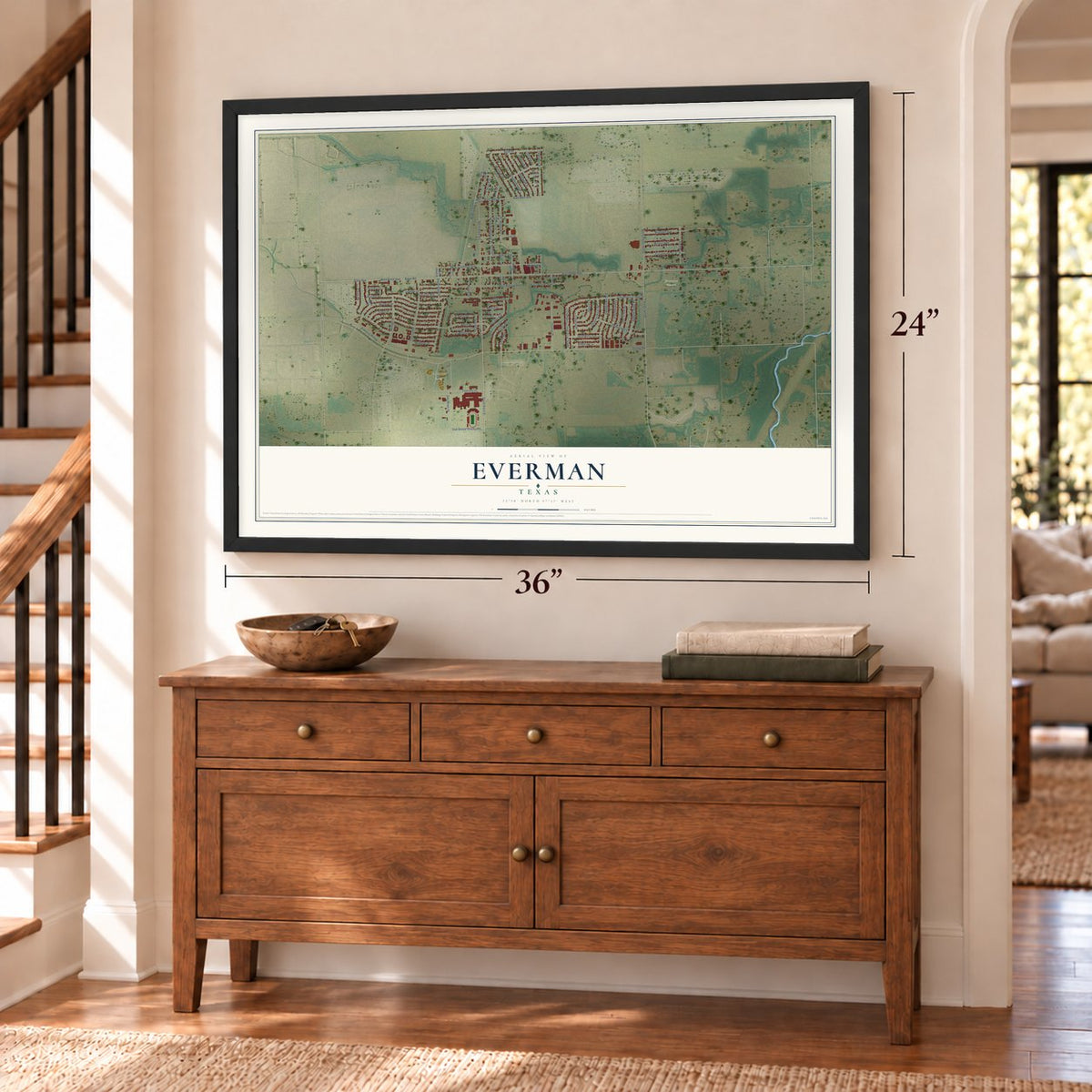 Everman, Texas map, 24 x 36 inch print in a black frame above a dresser by a staircase