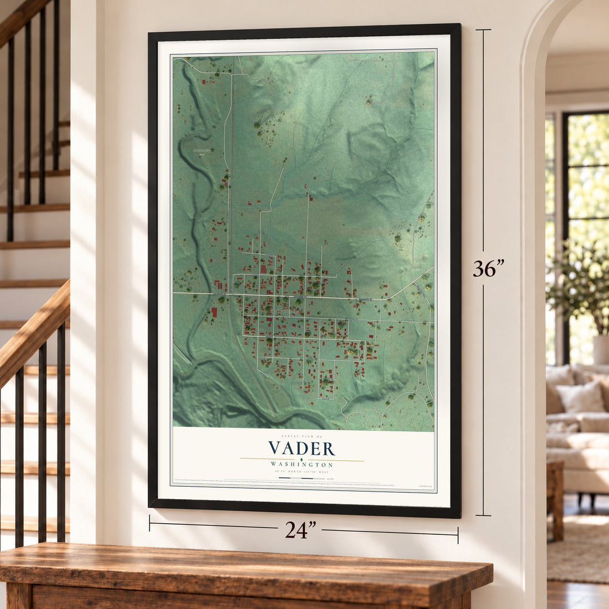 Vader, Washington map, 24 x 36 inch print in a black frame by a staircase