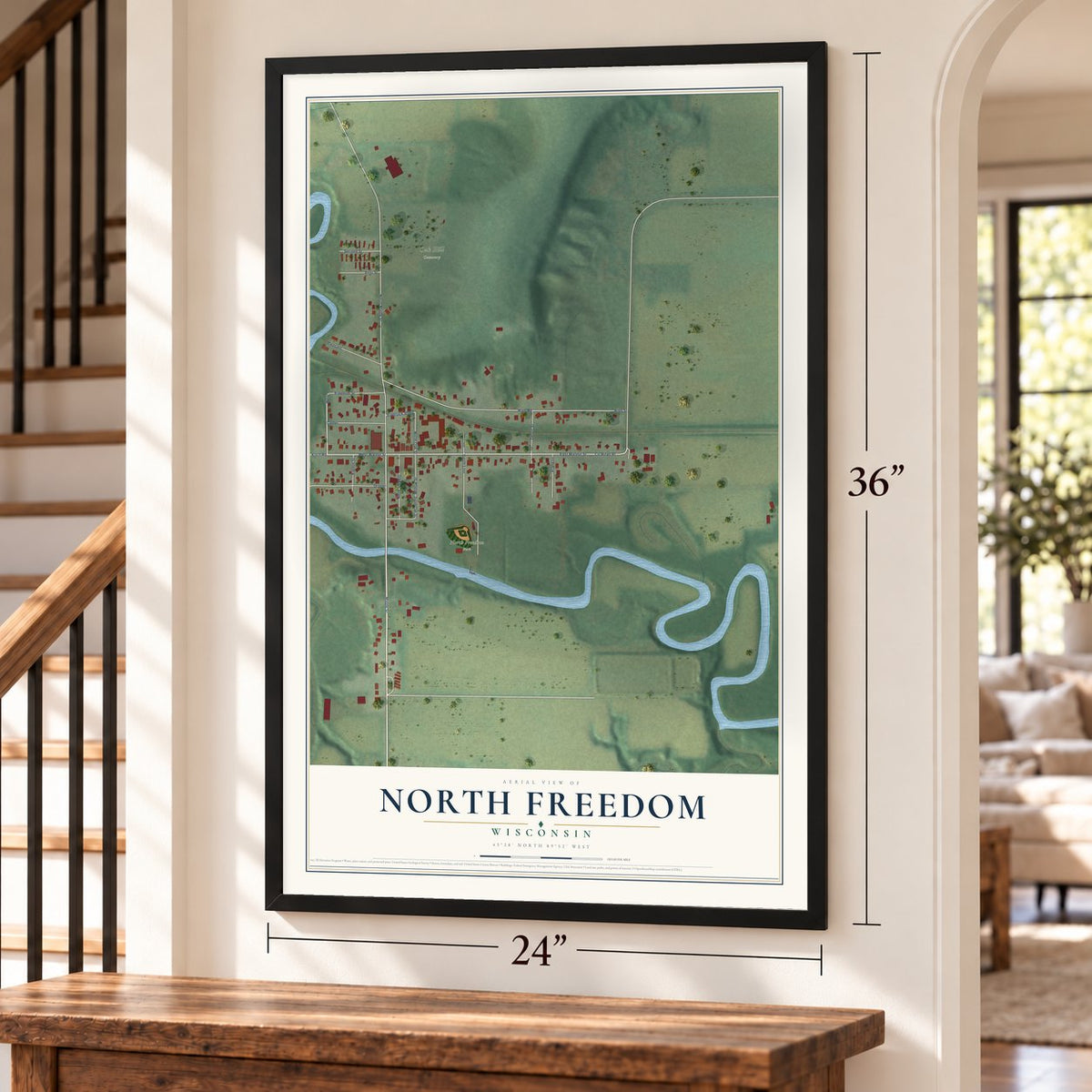 North Freedom, Wisconsin map, 24 x 36 inch print in a black frame by a staircase