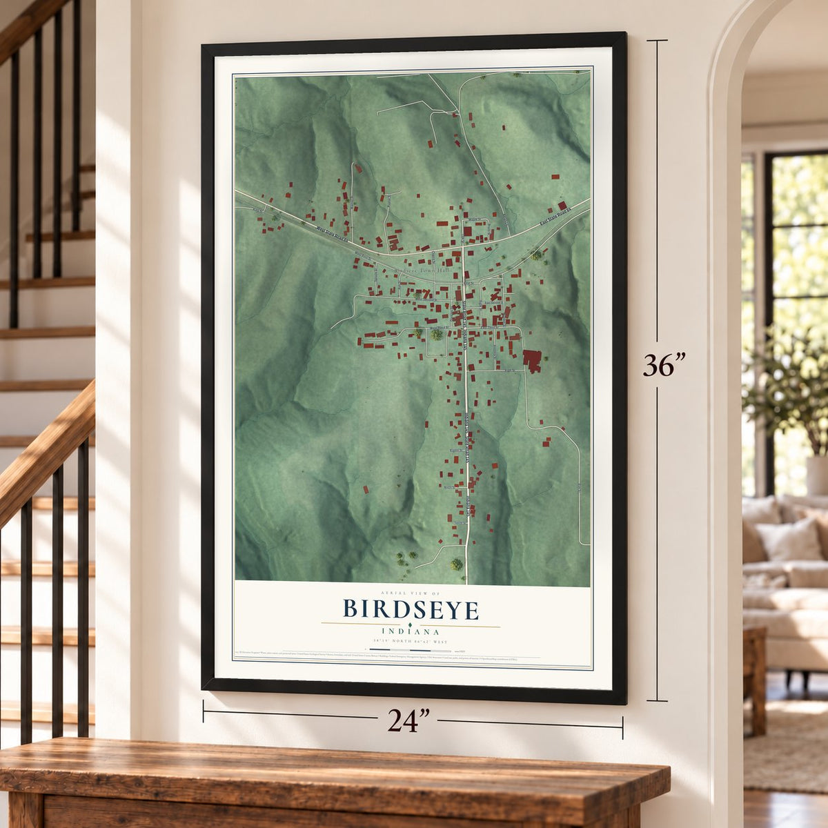 Birdseye, Indiana map, 24 x 36 inch print in a black frame by a staircase