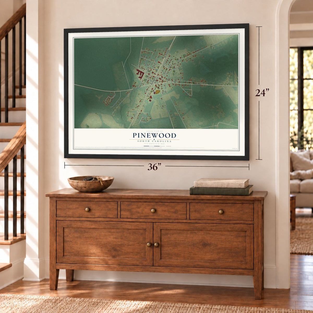 Pinewood, South Carolina map, 24 x 36 inch print in a black frame above a dresser by a staircase