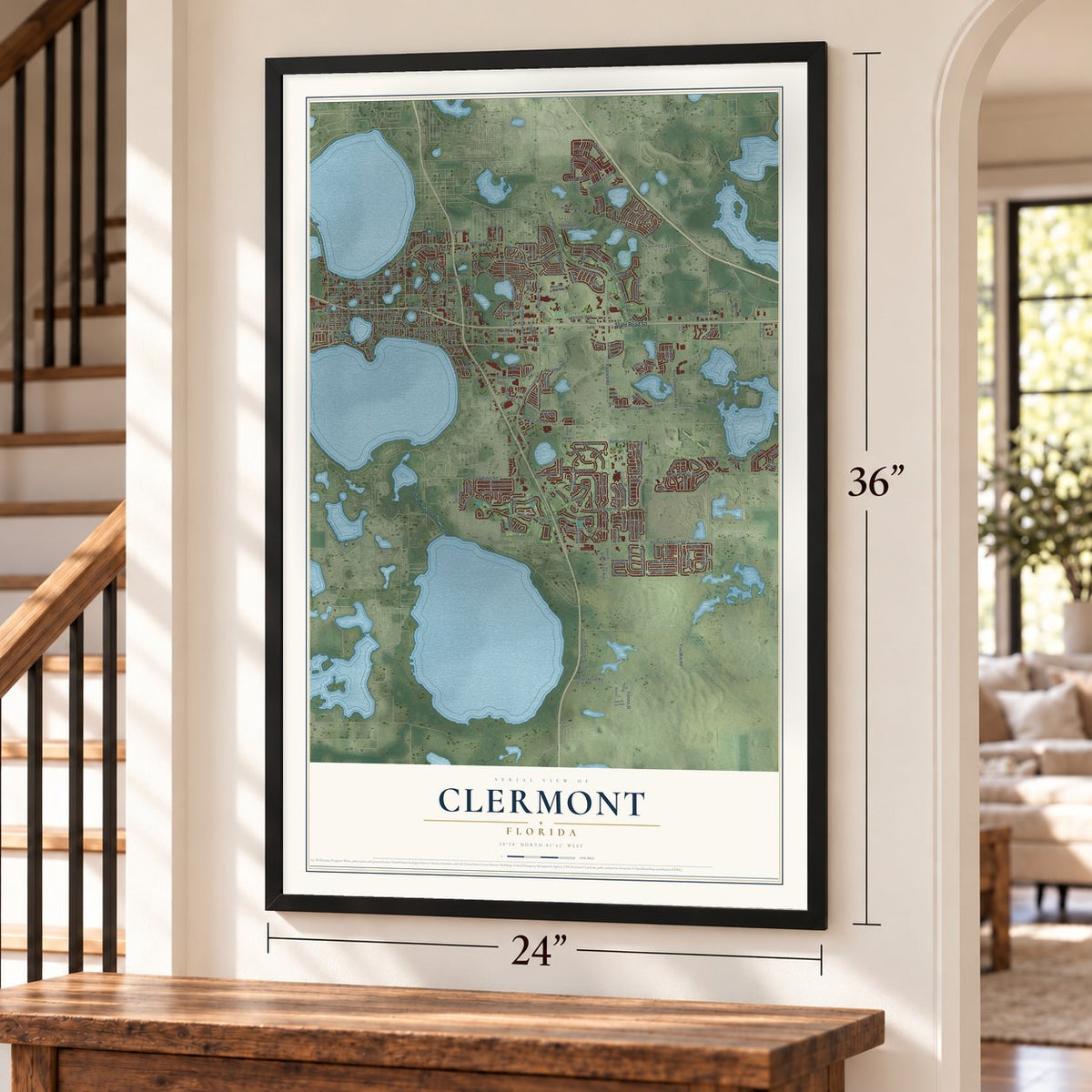 Clermont, Florida map, 24 x 36 inch print in a black frame by a staircase