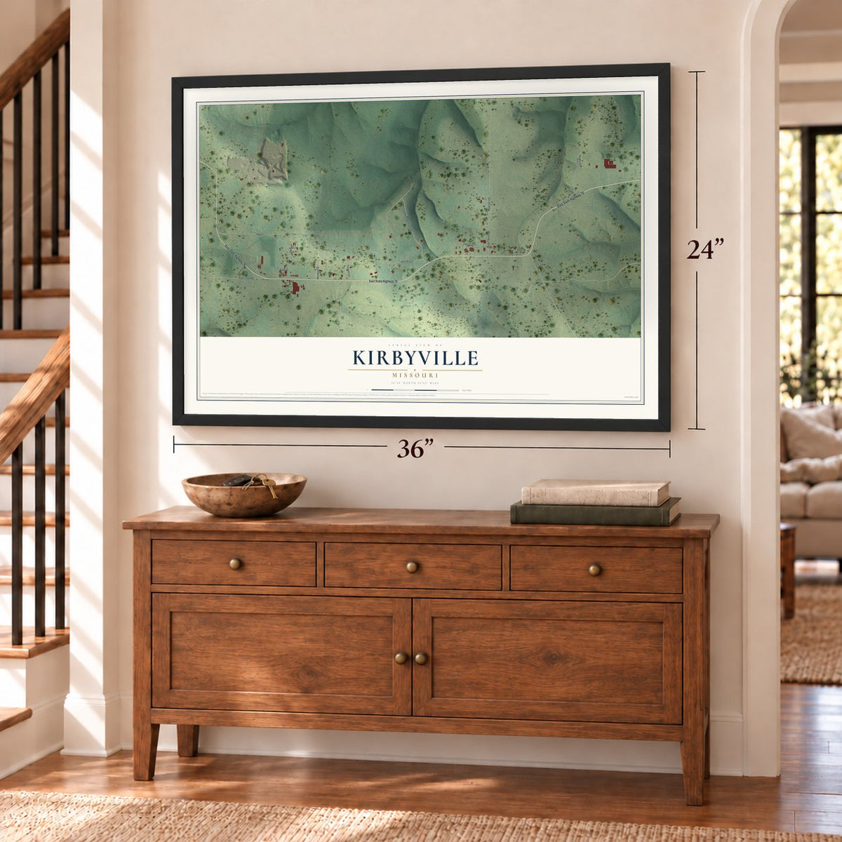 Kirbyville, Missouri map, 24 x 36 inch print in a black frame above a dresser by a staircase