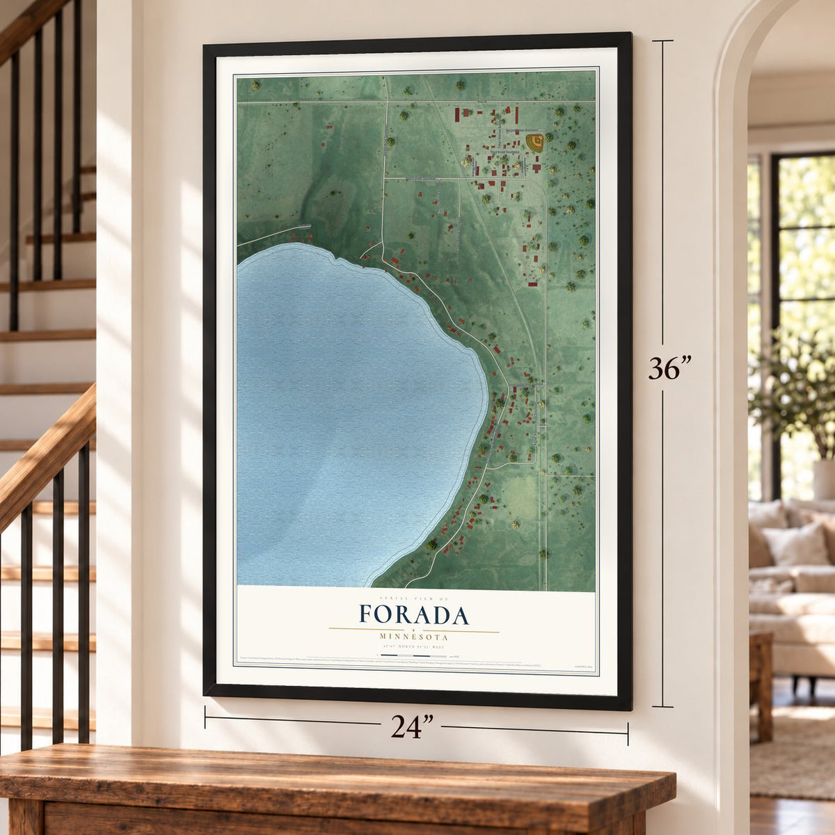 Forada, Minnesota map, 24 x 36 inch print in a black frame by a staircase
