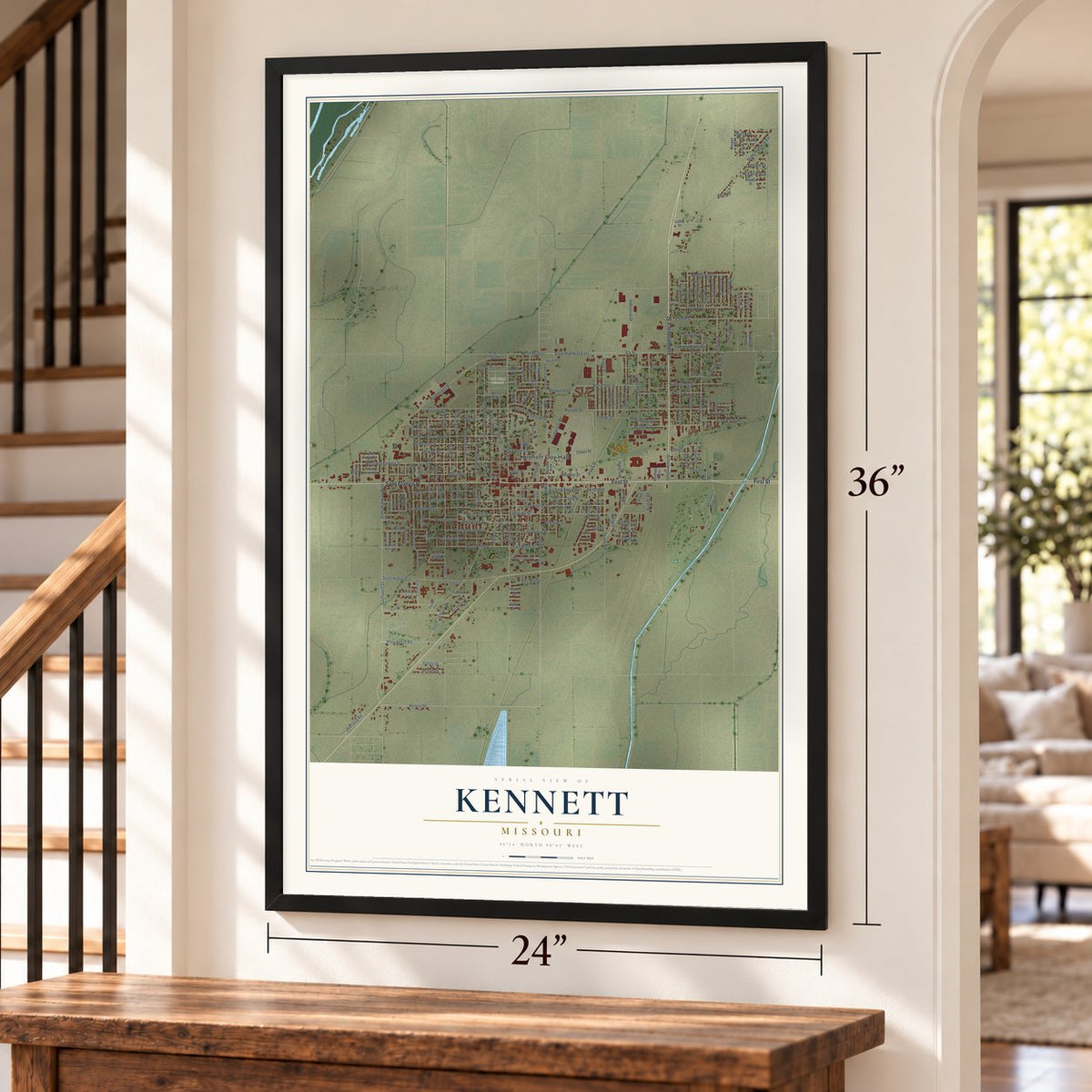 Kennett, Missouri map, 24 x 36 inch print in a black frame by a staircase