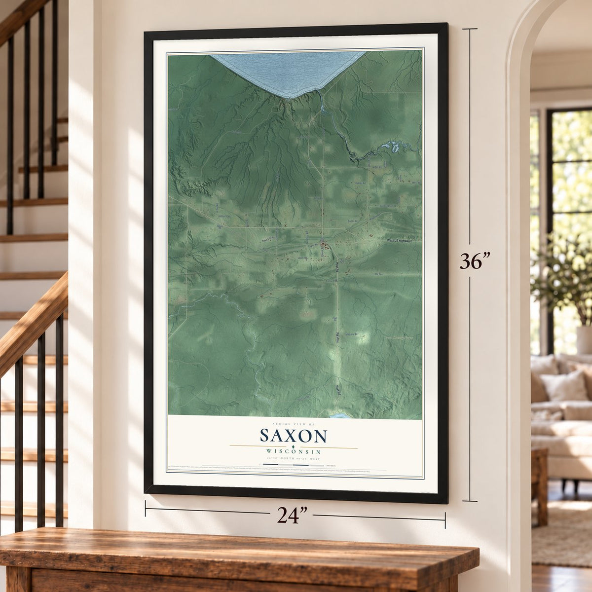Saxon, Wisconsin map, 24 x 36 inch print in a black frame by a staircase