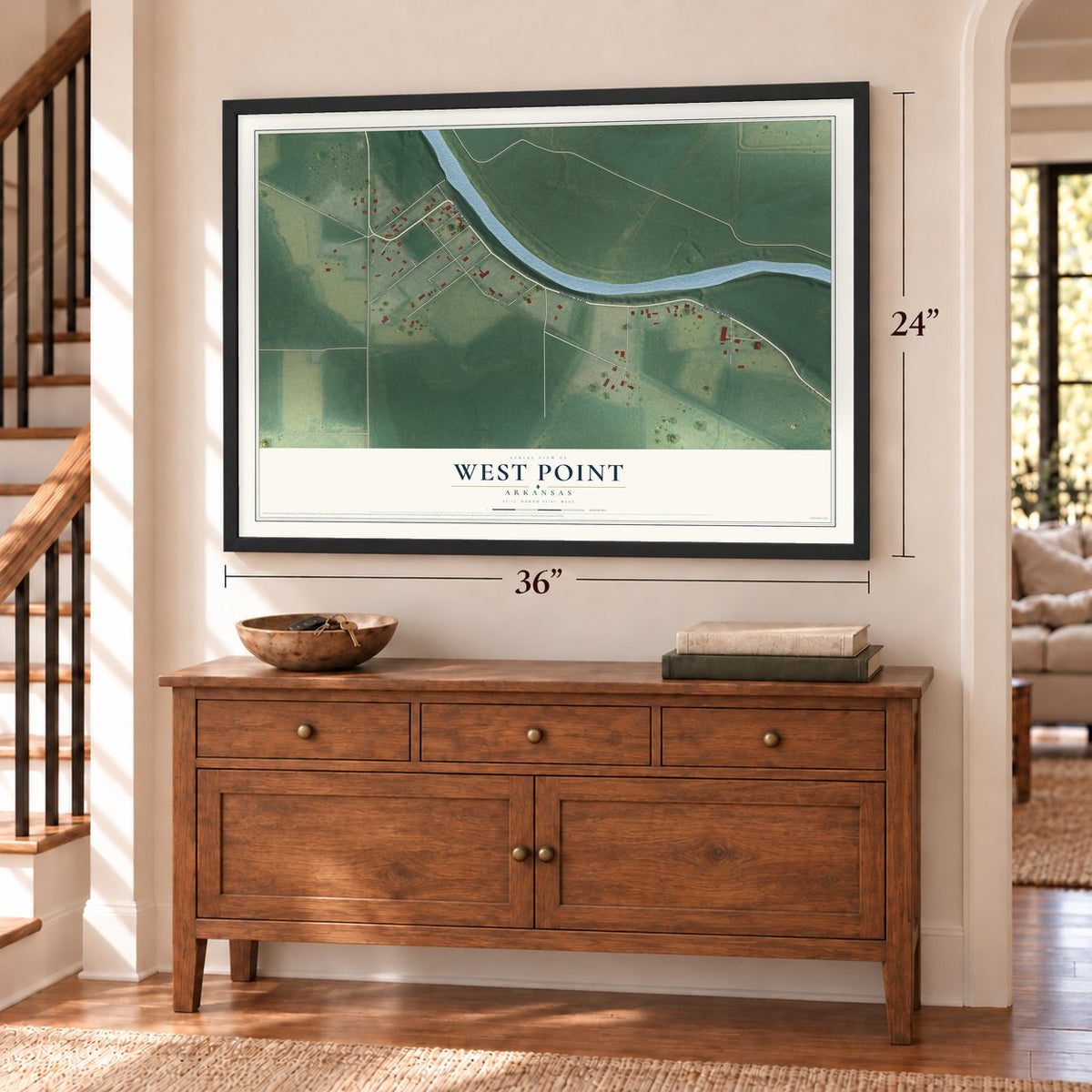 West Point, Arkansas map, 24 x 36 inch print in a black frame above a dresser by a staircase