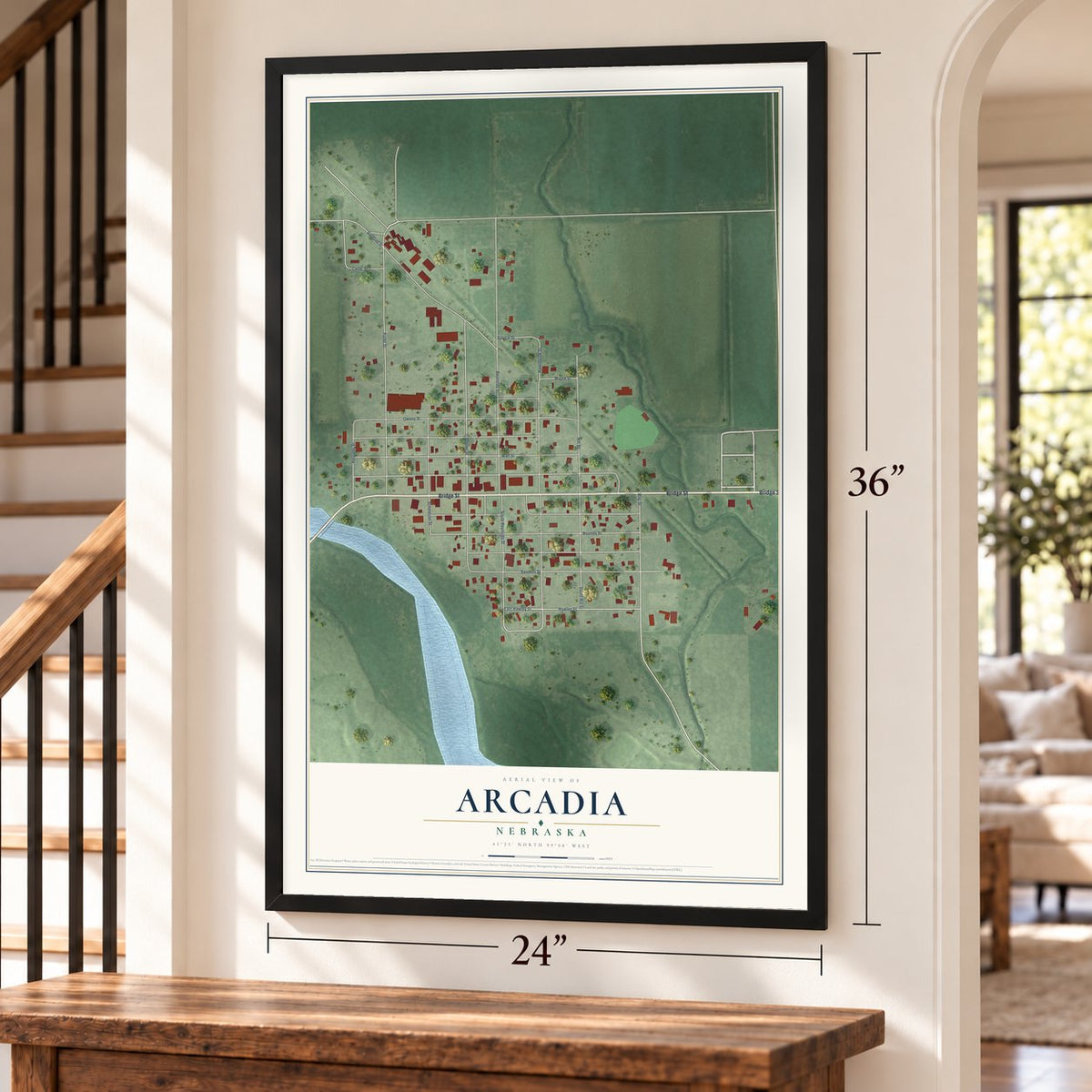 Arcadia, Nebraska map, 24 x 36 inch print in a black frame by a staircase
