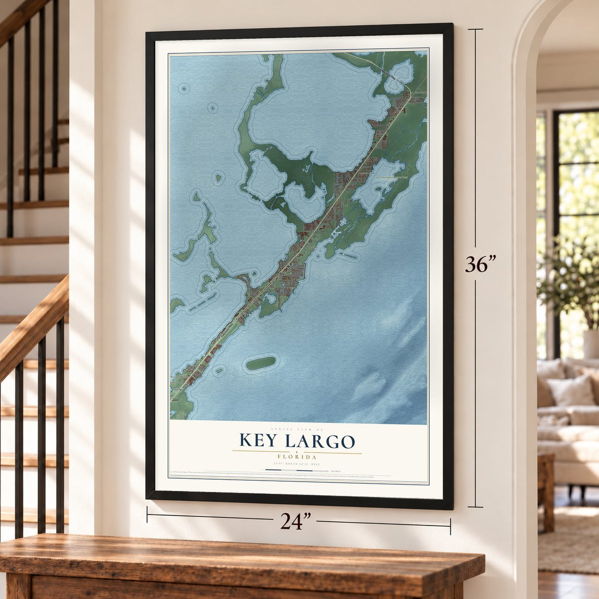 Key Largo, Florida map, 24 x 36 inch print in a black frame by a staircase