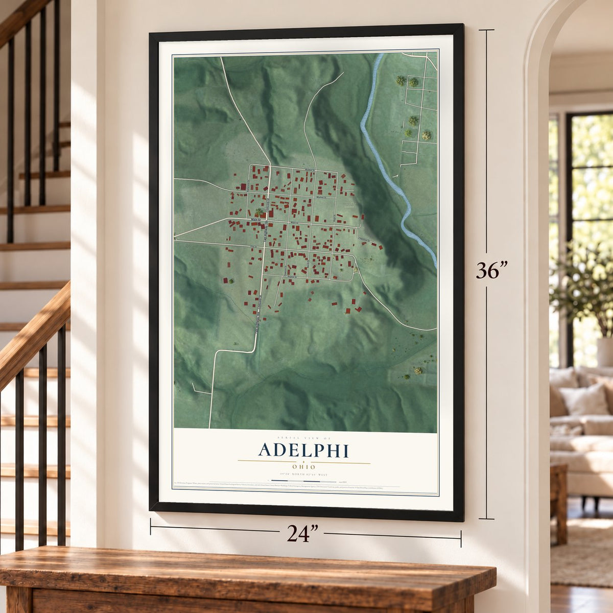 Adelphi, Ohio map, 24 x 36 inch print in a black frame by a staircase