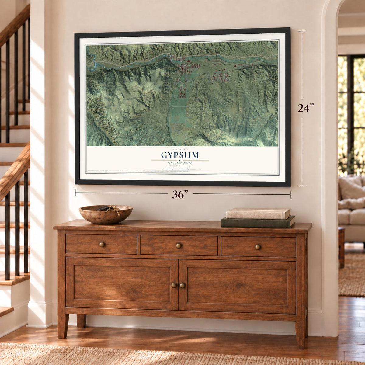 Gypsum, Colorado map, 24 x 36 inch print in a black frame above a dresser by a staircase