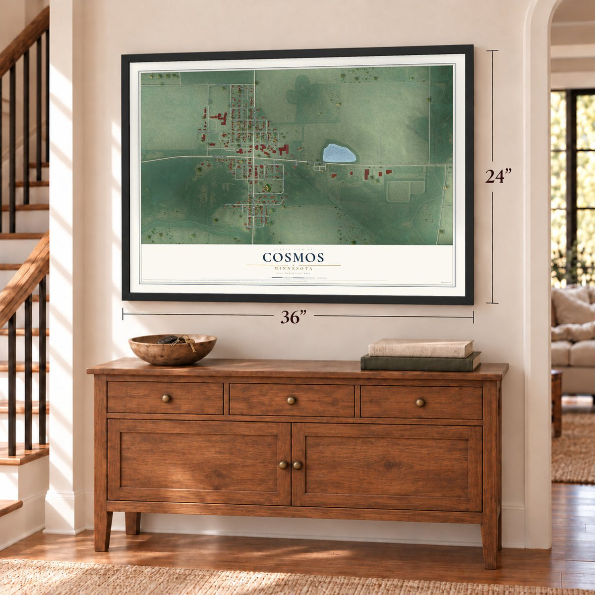 Cosmos, Minnesota map, 24 x 36 inch print in a black frame above a dresser by a staircase