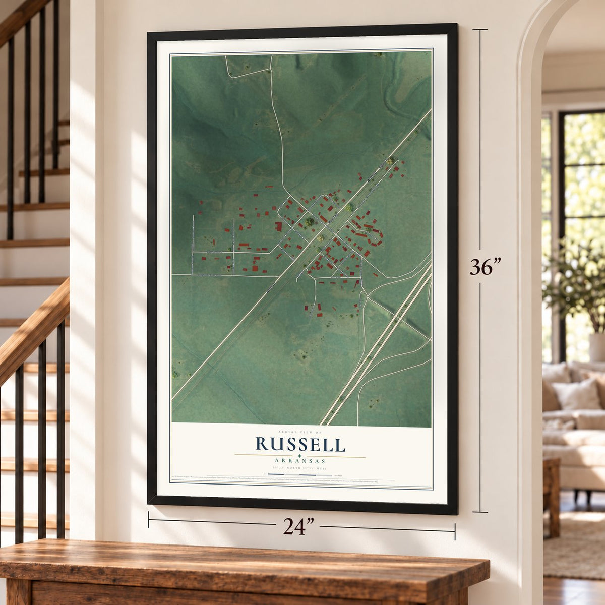 Russell, Arkansas map, 24 x 36 inch print in a black frame by a staircase