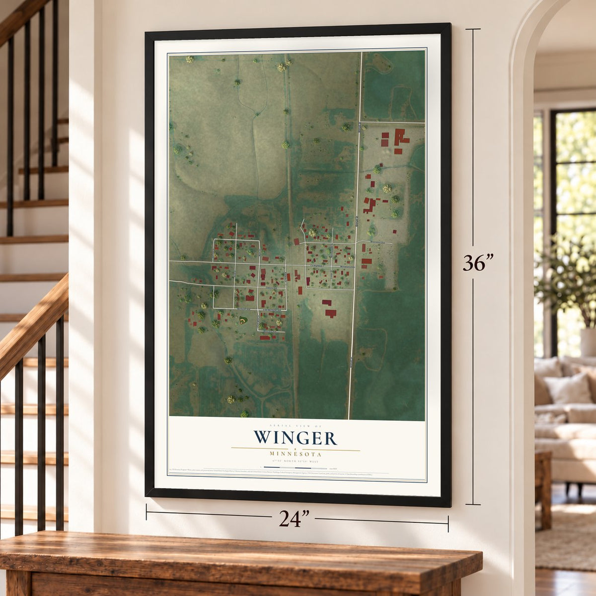 Winger, Minnesota map, 24 x 36 inch print in a black frame by a staircase