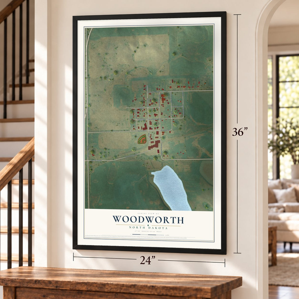 Woodworth, North Dakota map, 24 x 36 inch print in a black frame by a staircase