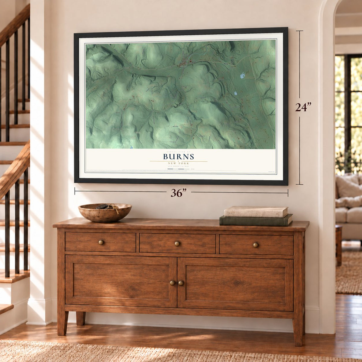 Burns, New York map, 24 x 36 inch print in a black frame above a dresser by a staircase