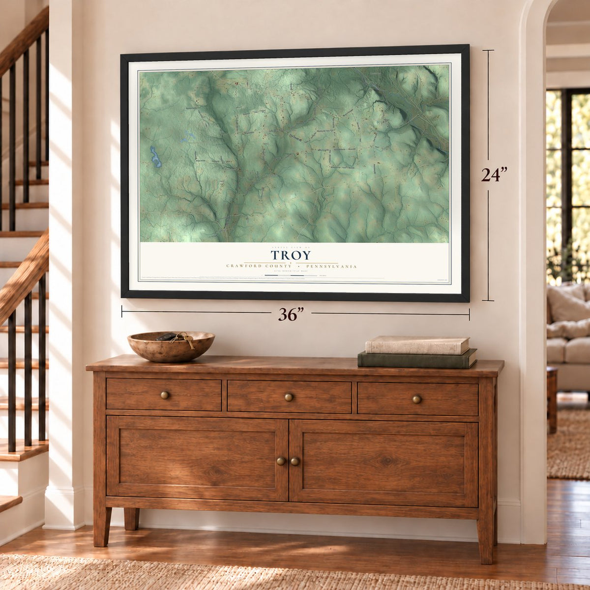 Troy, Crawford County, Pennsylvania map, 24 x 36 inch print in a black frame above a dresser by a staircase