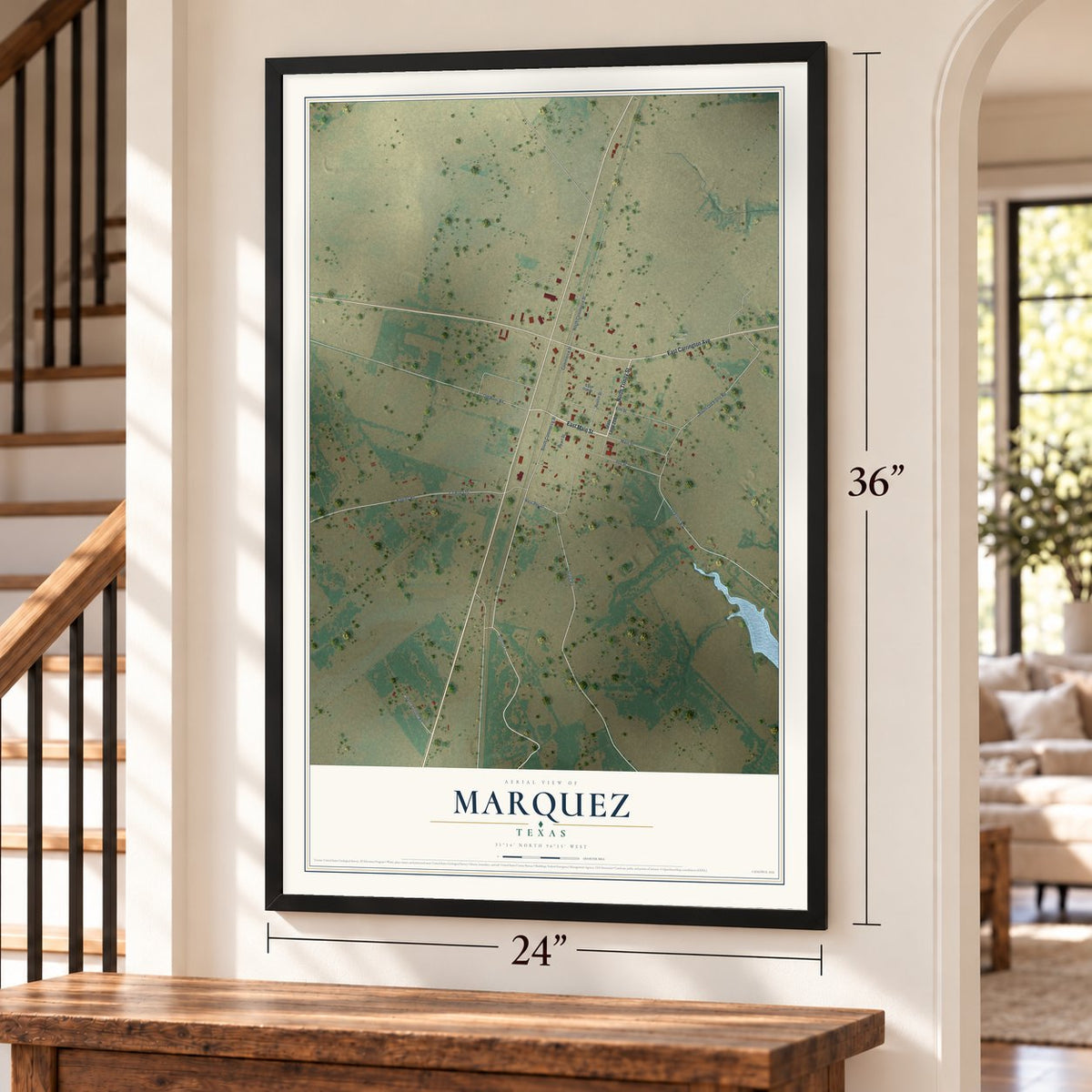 Marquez, Texas map, 24 x 36 inch print in a black frame by a staircase