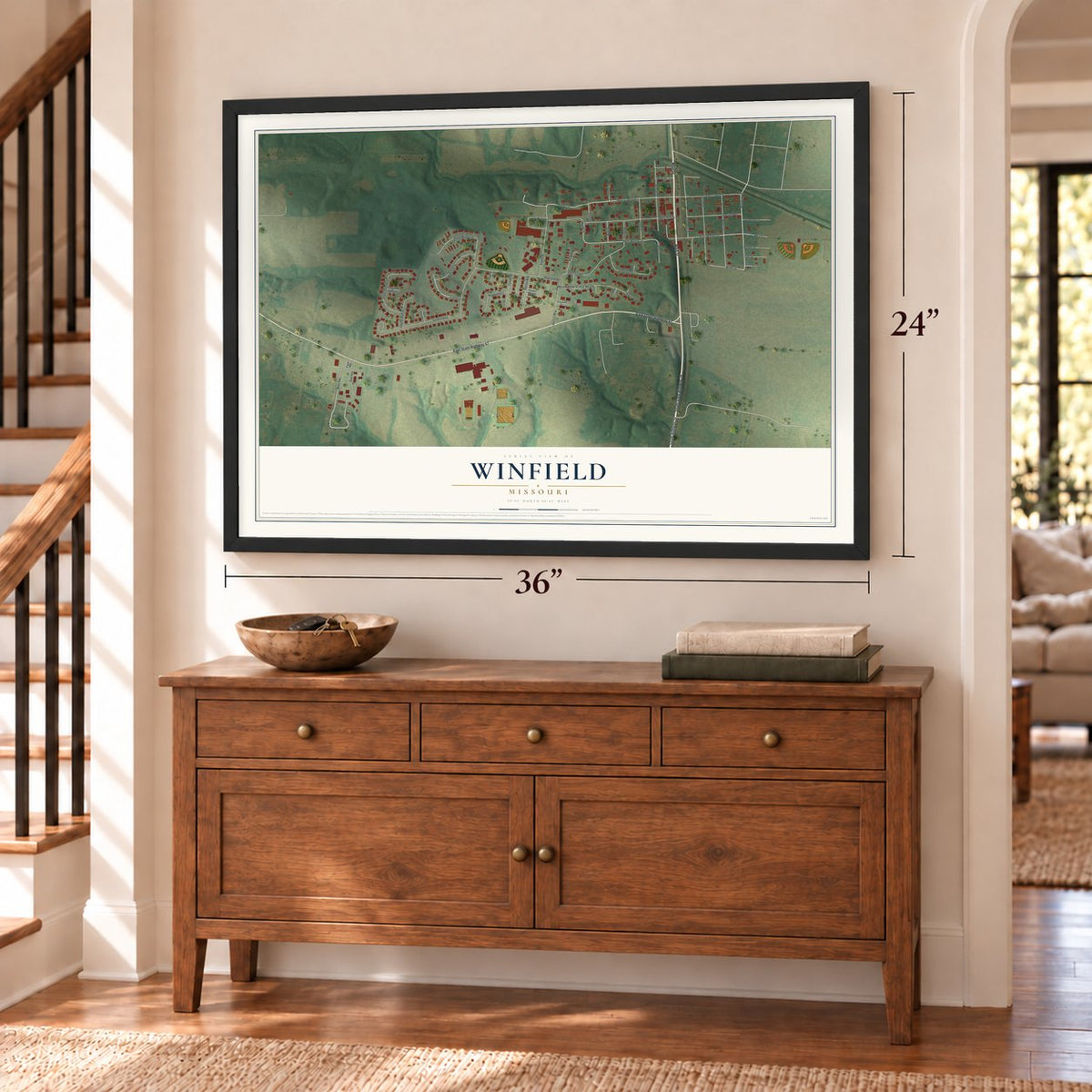 Winfield, Missouri map, 24 x 36 inch print in a black frame above a dresser by a staircase