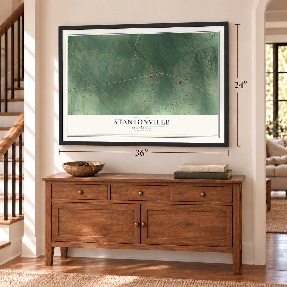 Stantonville, Tennessee map, 24 x 36 inch print in a black frame above a dresser by a staircase