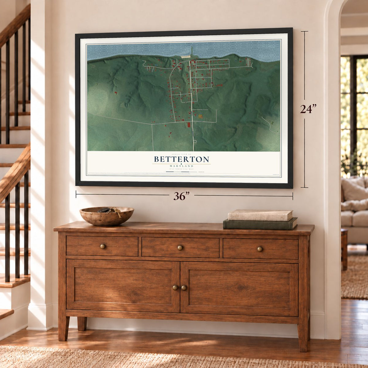 Betterton, Maryland map, 24 x 36 inch print in a black frame above a dresser by a staircase