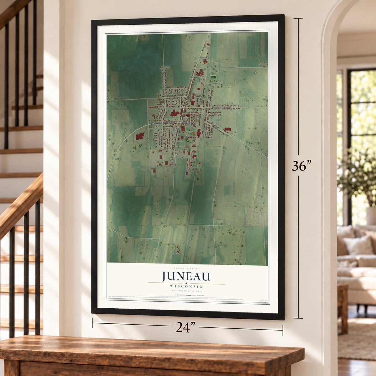 Juneau, Wisconsin map, 24 x 36 inch print in a black frame by a staircase