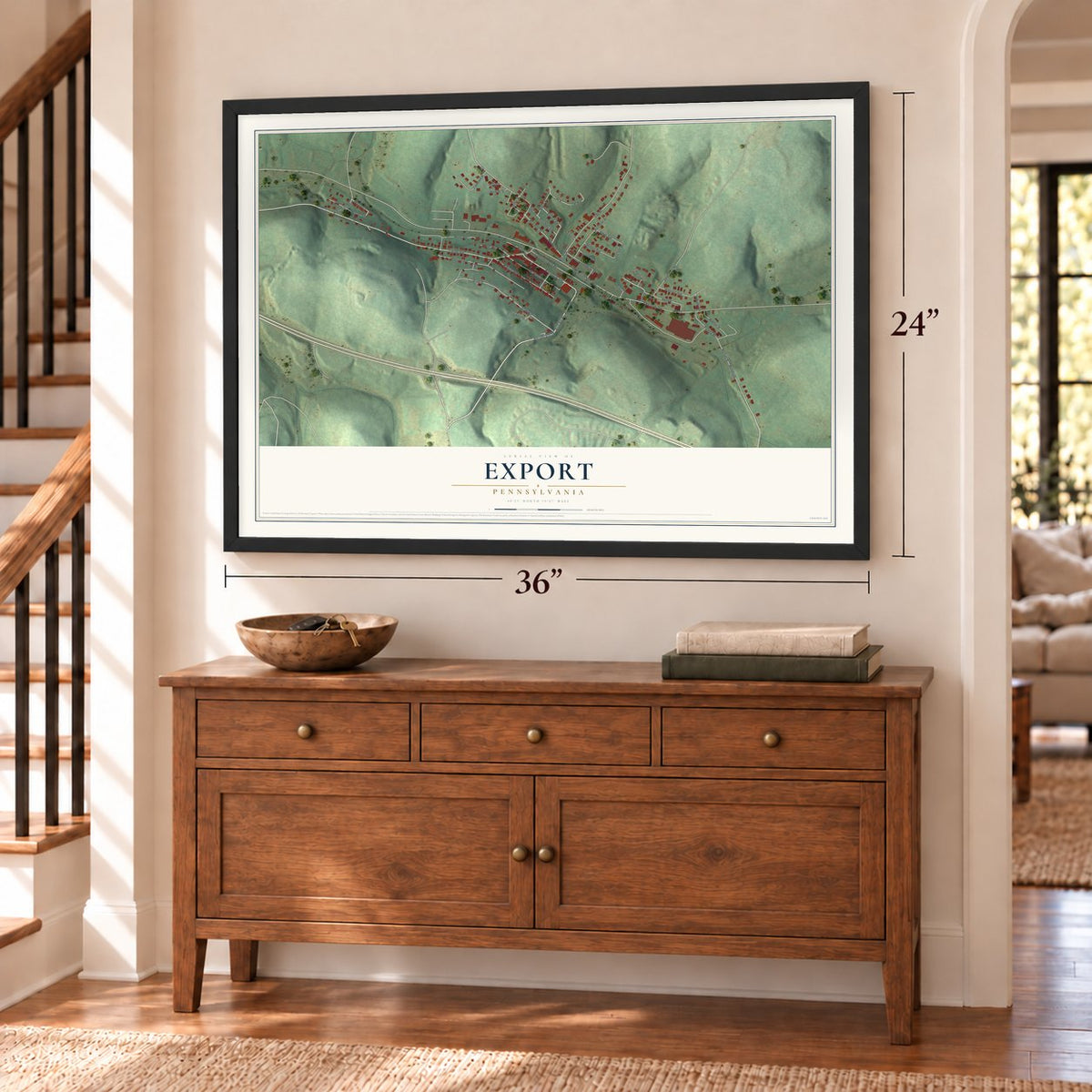 Export, Pennsylvania map, 24 x 36 inch print in a black frame above a dresser by a staircase