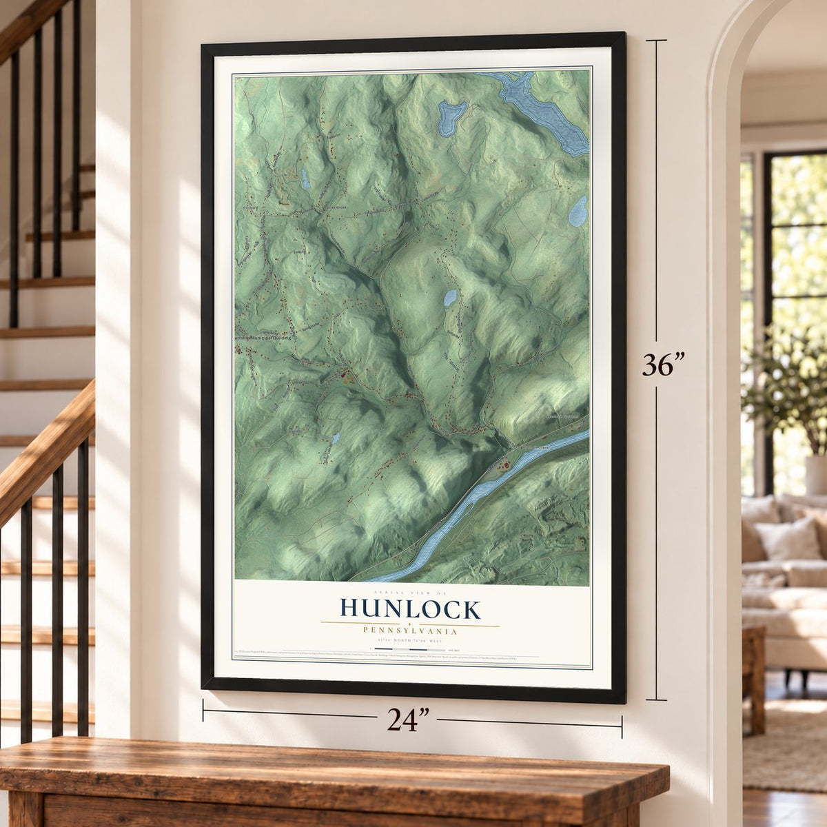 Hunlock, Pennsylvania map, 24 x 36 inch print in a black frame by a staircase