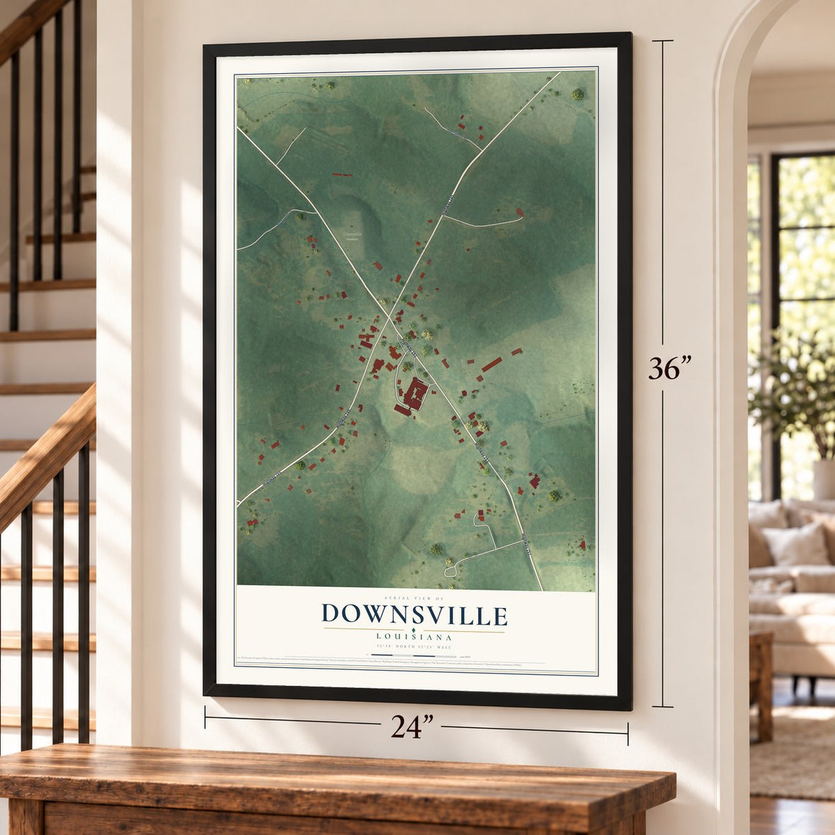 Downsville, Louisiana map, 24 x 36 inch print in a black frame by a staircase