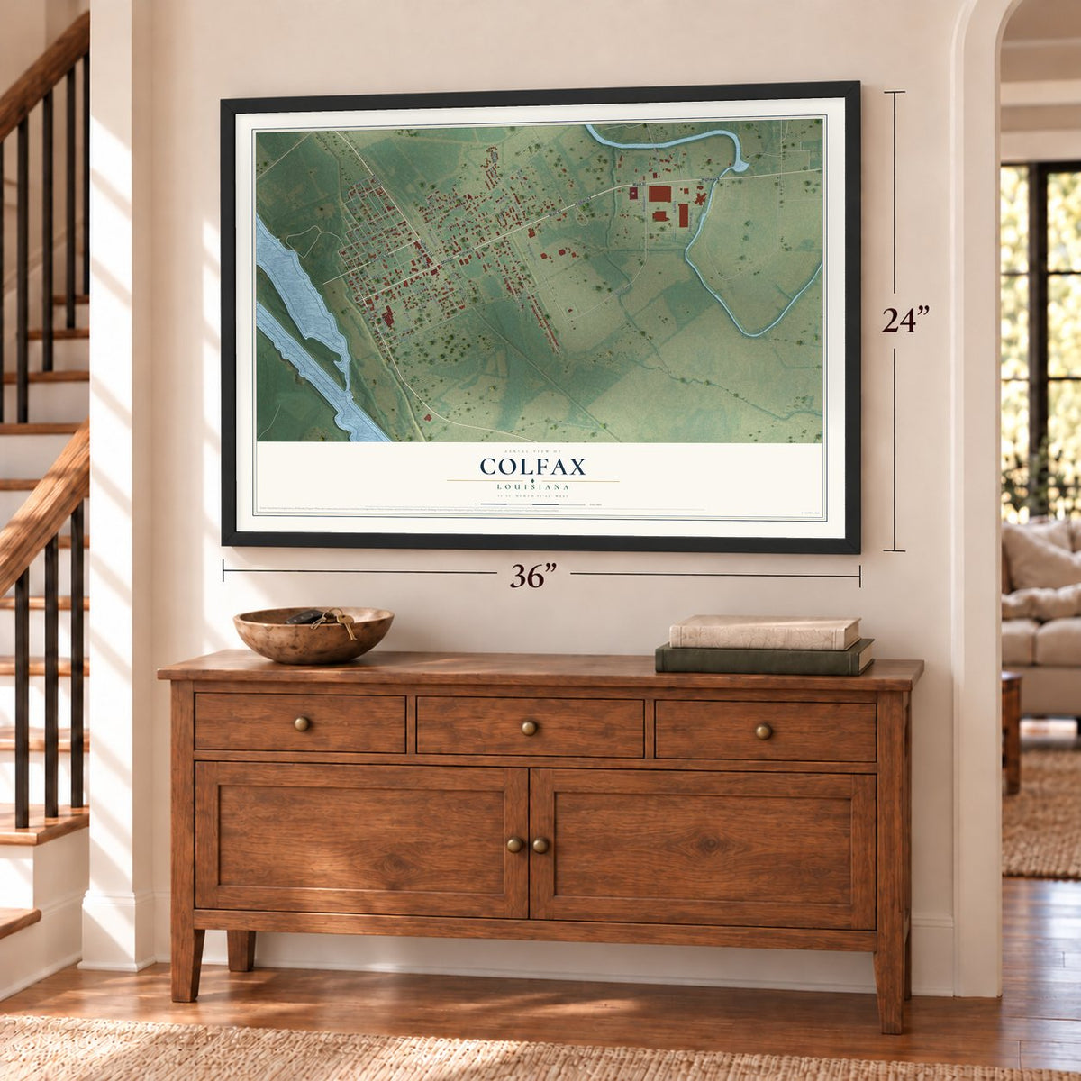Colfax, Louisiana map, 24 x 36 inch print in a black frame above a dresser by a staircase