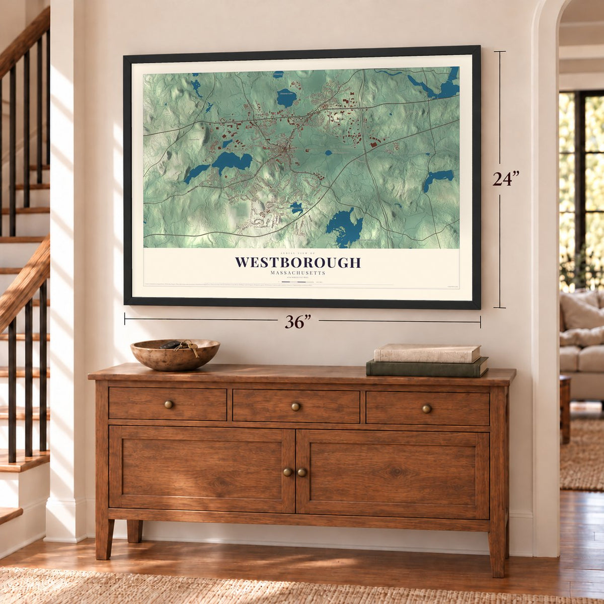 Westborough, Massachusetts map, 24 x 36 inch print in a black frame above a dresser by a staircase