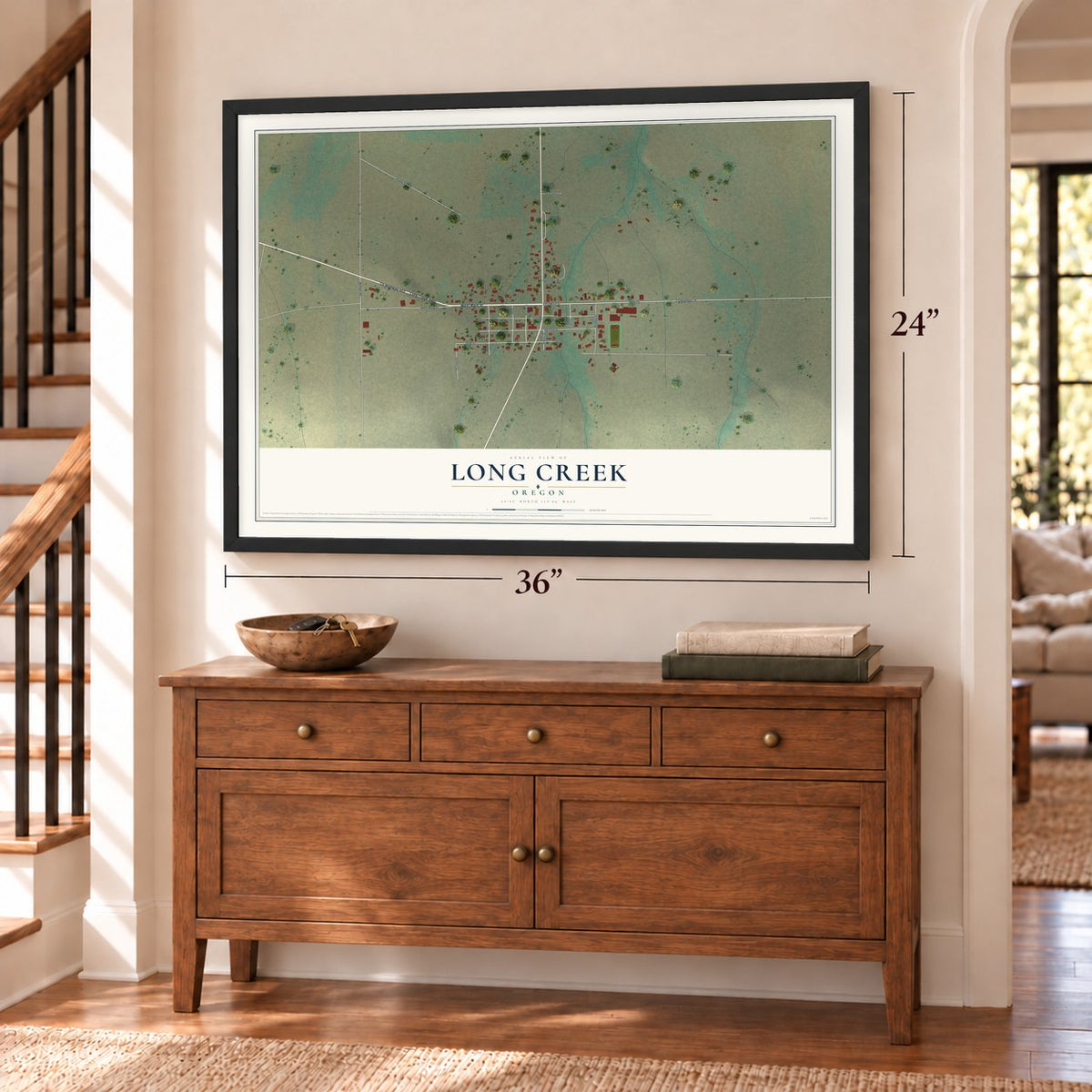 Long Creek, Oregon map, 24 x 36 inch print in a black frame above a dresser by a staircase