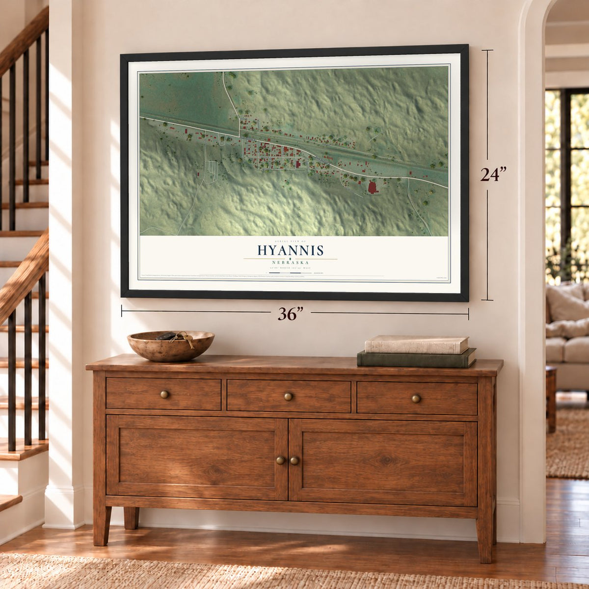 Hyannis, Nebraska map, 24 x 36 inch print in a black frame above a dresser by a staircase