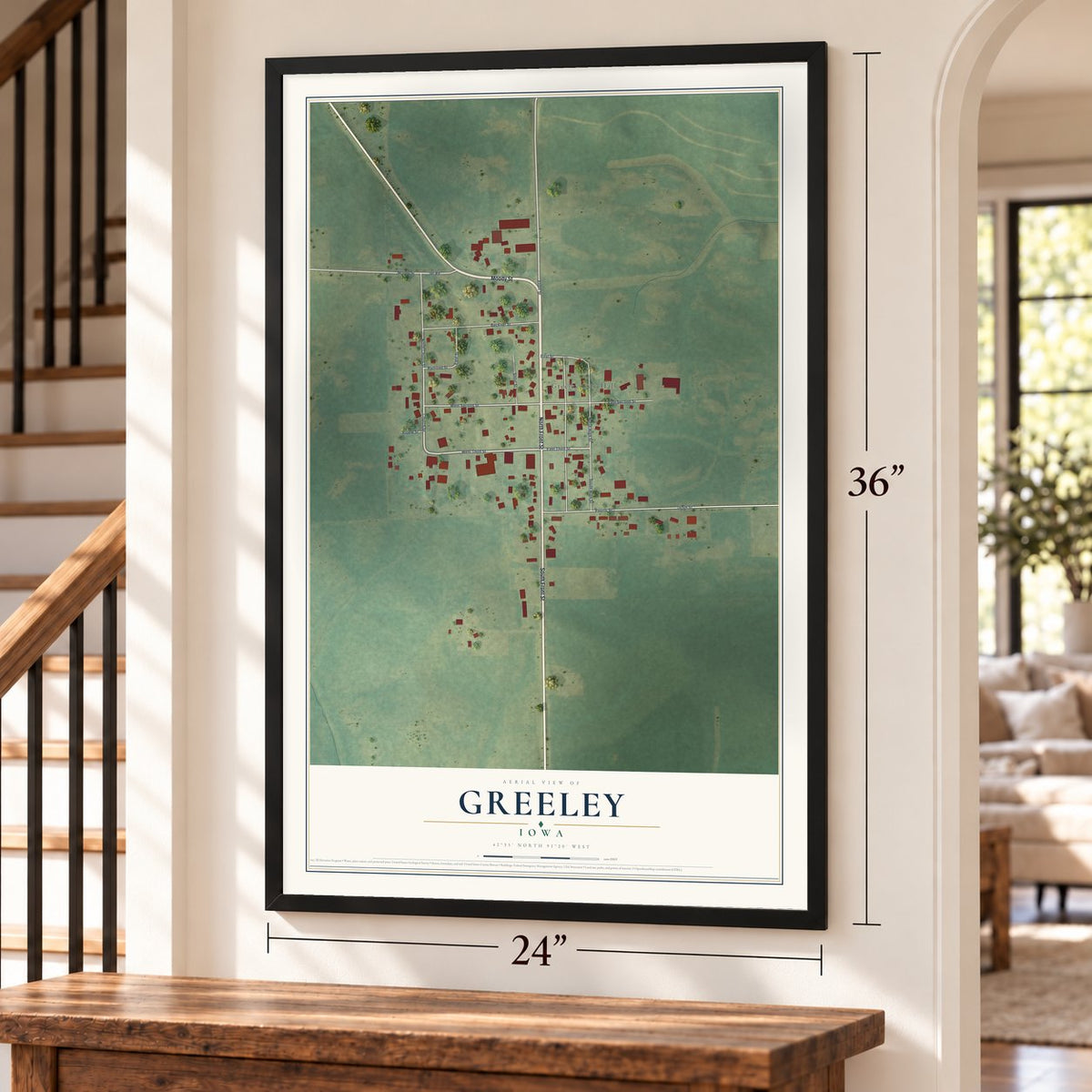 Greeley, Iowa map, 24 x 36 inch print in a black frame by a staircase