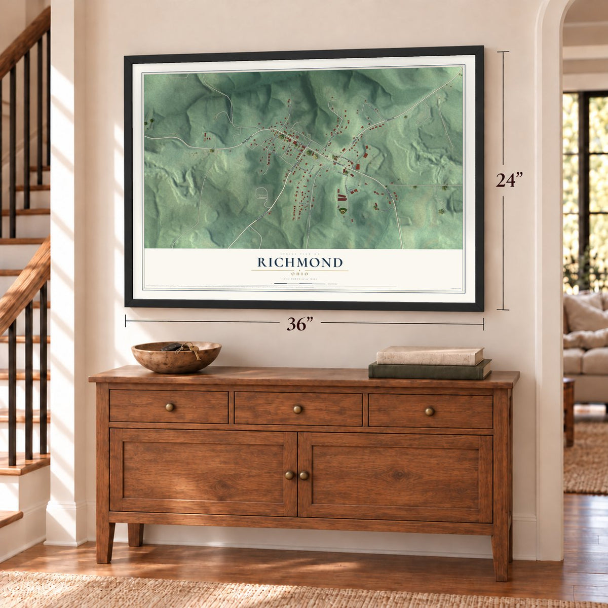Richmond, Ohio map, 24 x 36 inch print in a black frame above a dresser by a staircase