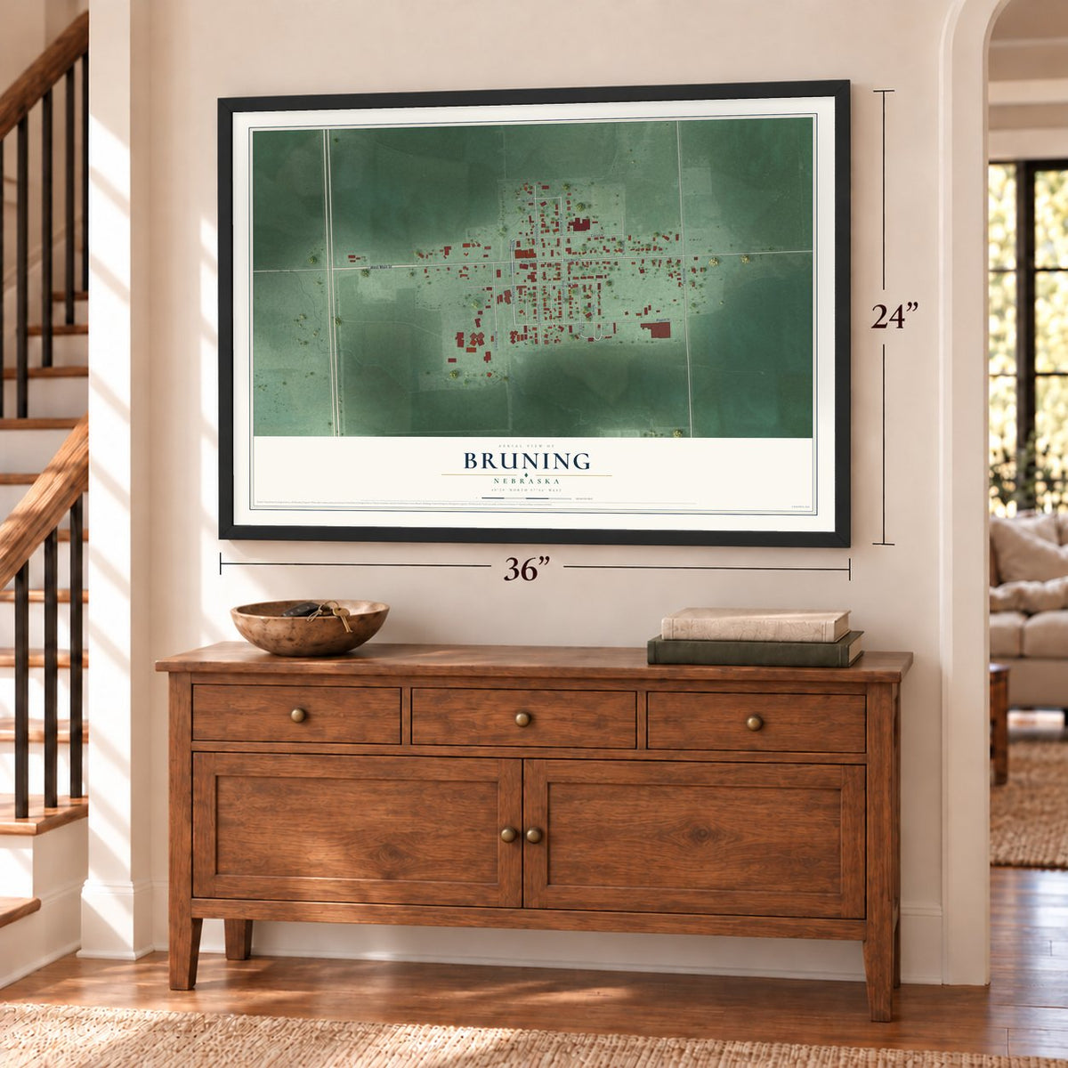 Bruning, Nebraska map, 24 x 36 inch print in a black frame above a dresser by a staircase