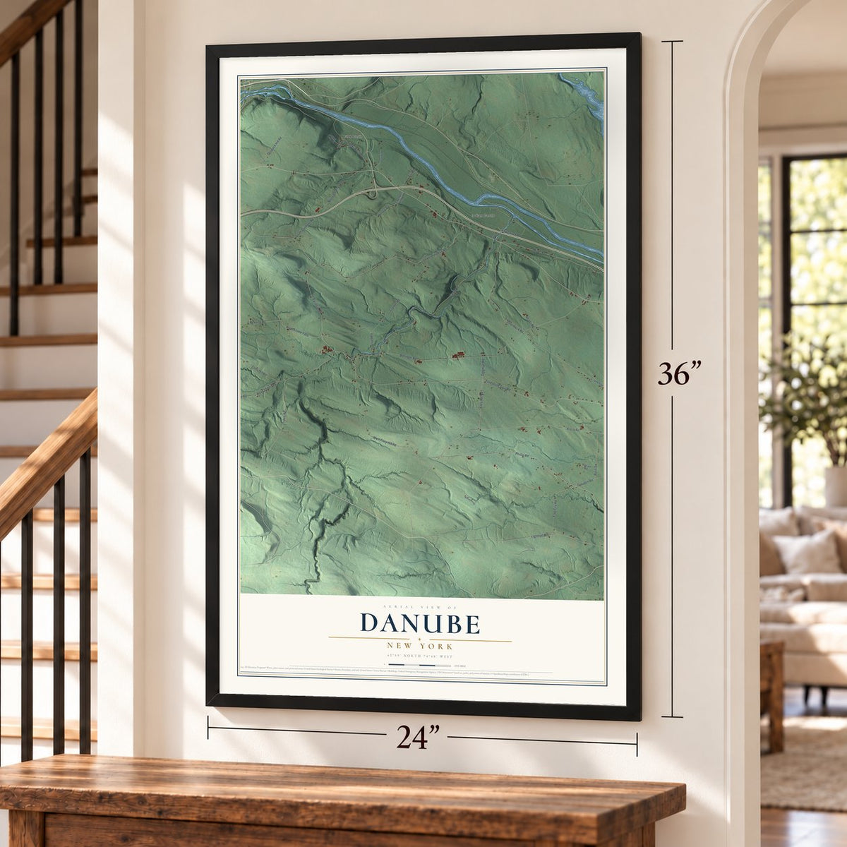 Danube, New York map, 24 x 36 inch print in a black frame by a staircase