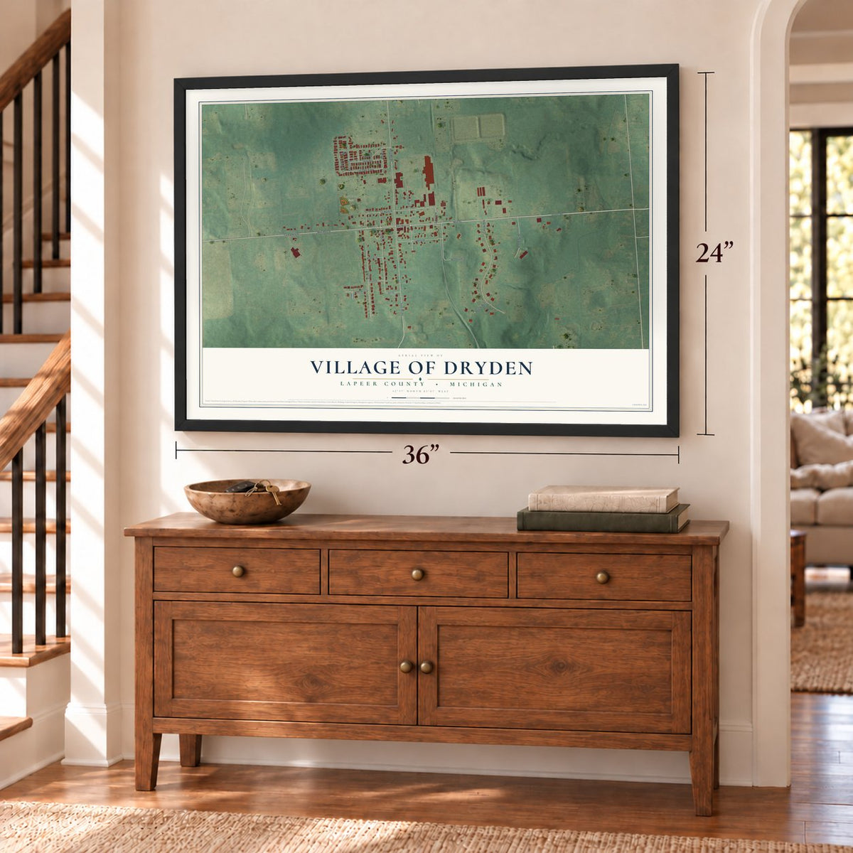 Dryden, Michigan map, 24 x 36 inch print in a black frame above a dresser by a staircase
