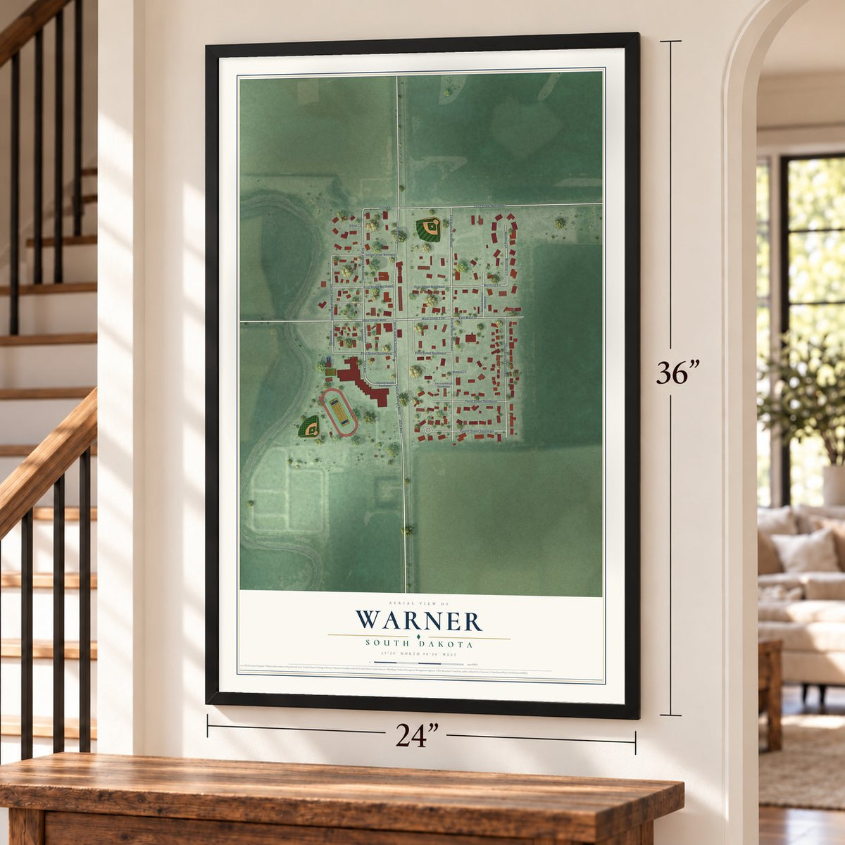 Warner, South Dakota map, 24 x 36 inch print in a black frame by a staircase