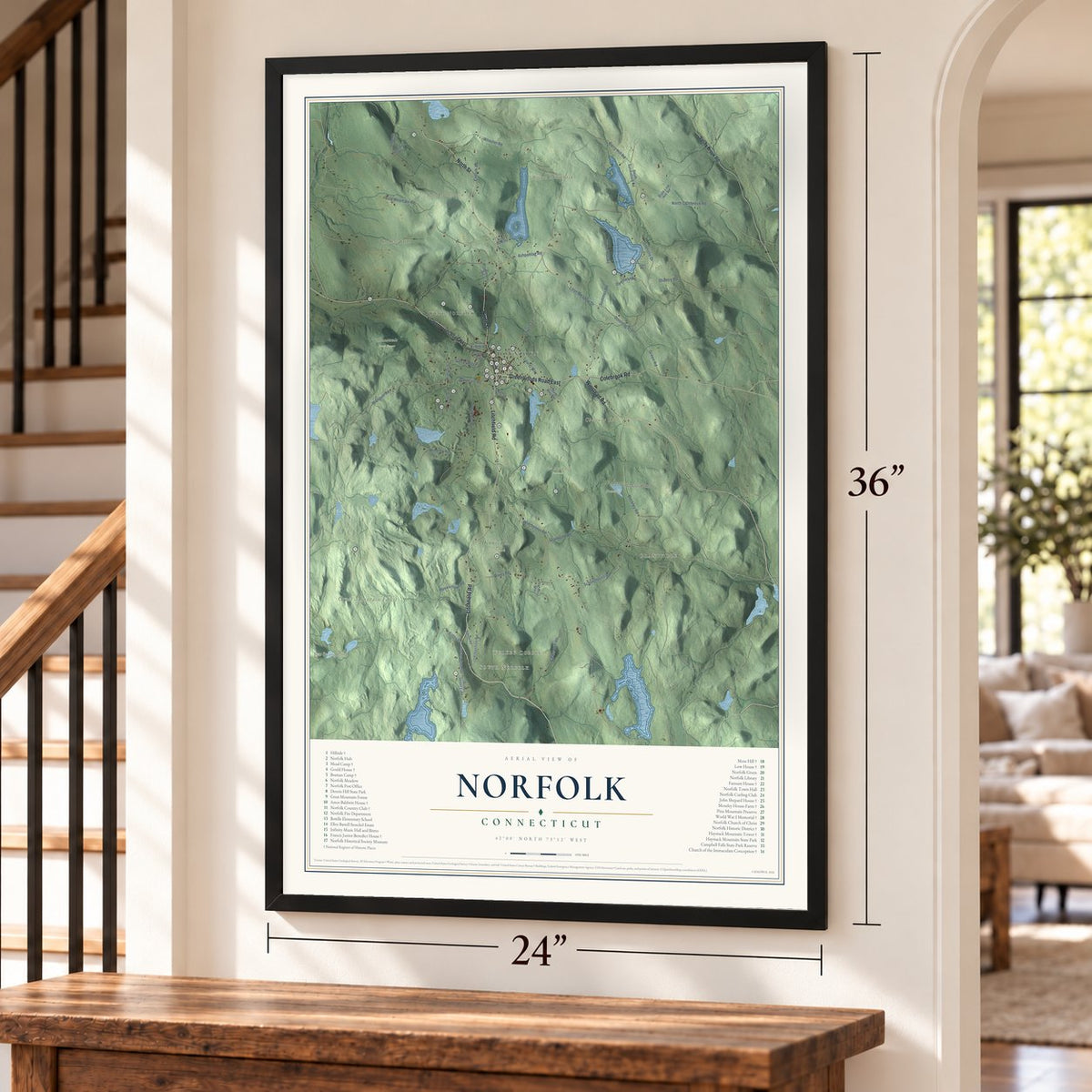 Norfolk, Connecticut map, 24 x 36 inch print in a black frame by a staircase