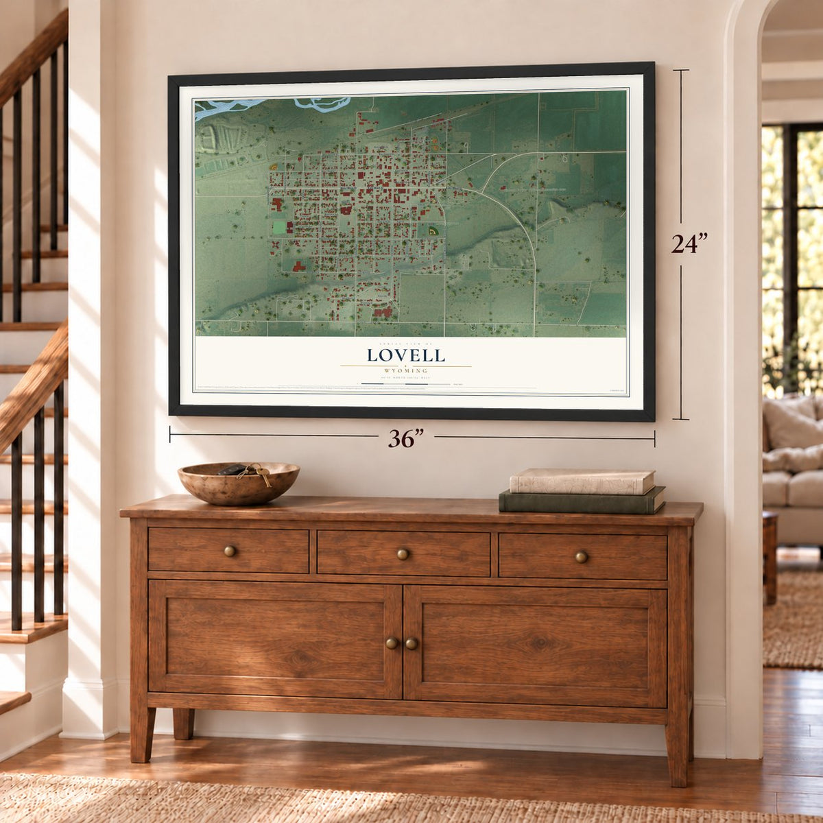 Lovell, Wyoming map, 24 x 36 inch print in a black frame above a dresser by a staircase