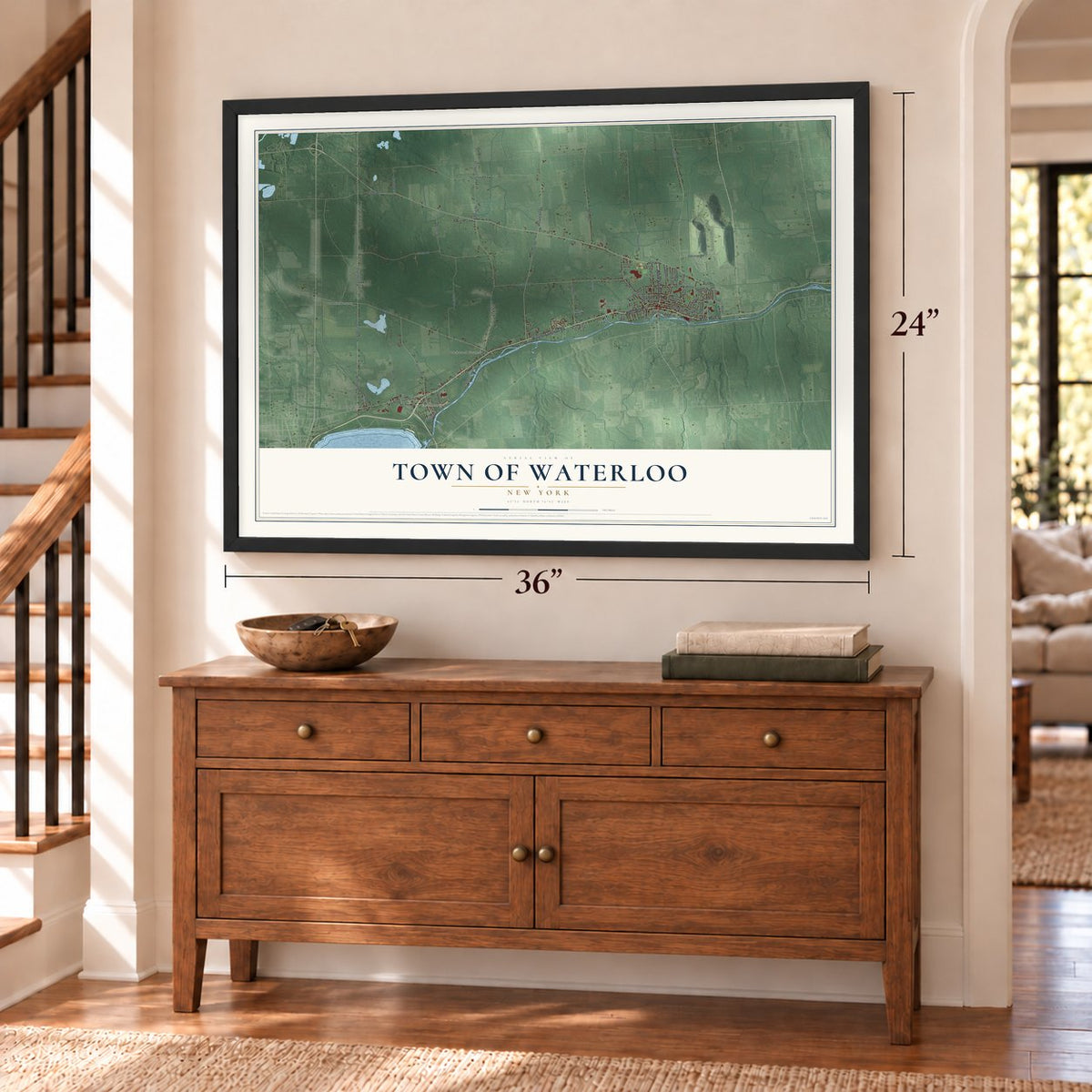 Town of Waterloo, New York map, 24 x 36 inch print in a black frame above a dresser by a staircase