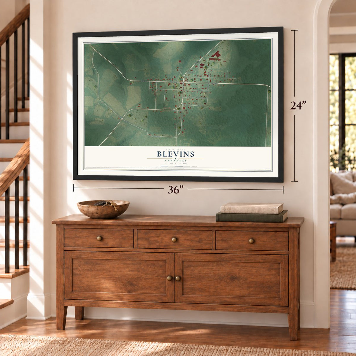 Blevins, Arkansas map, 24 x 36 inch print in a black frame above a dresser by a staircase