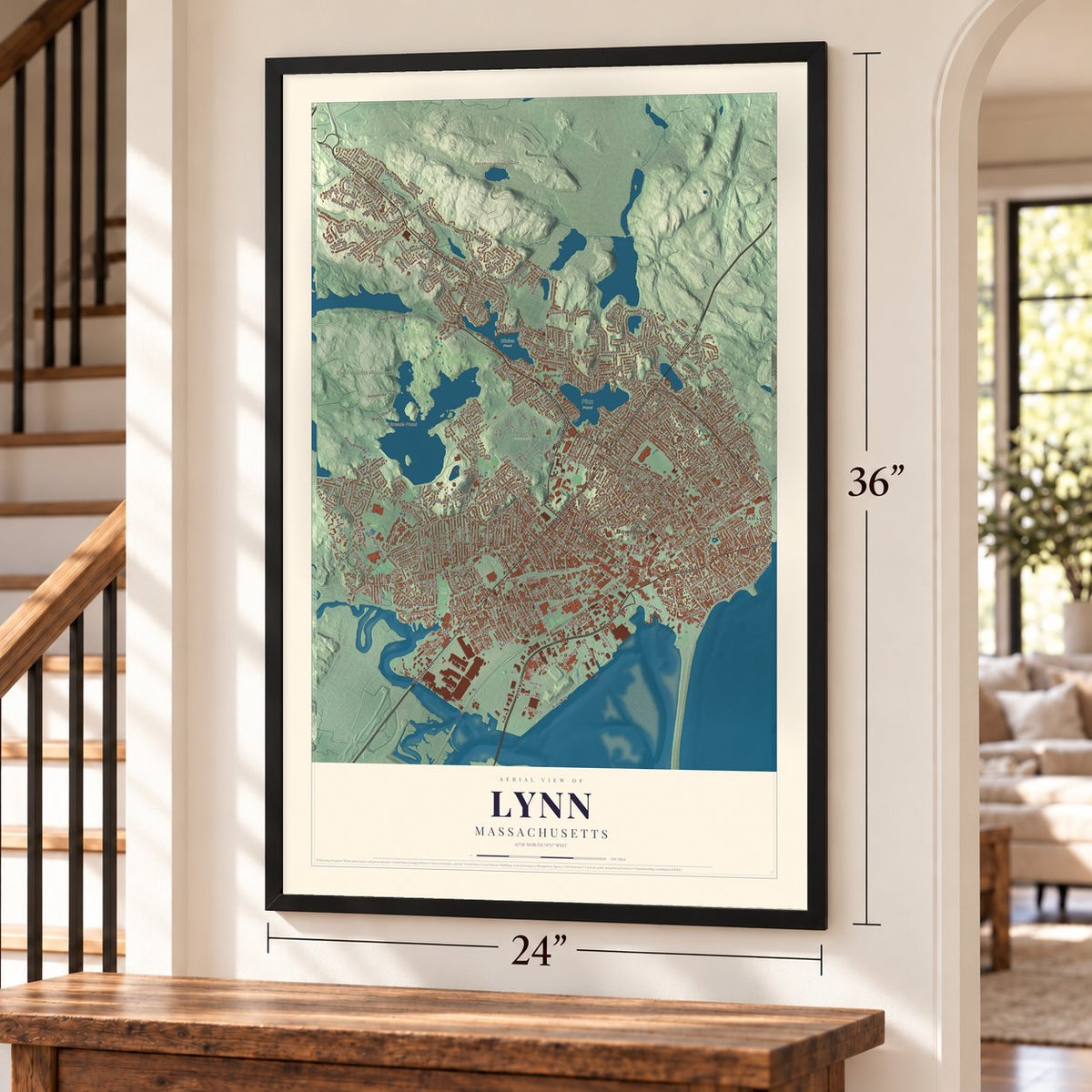 Lynn, Massachusetts map, 24 x 36 inch print in a black frame by a staircase