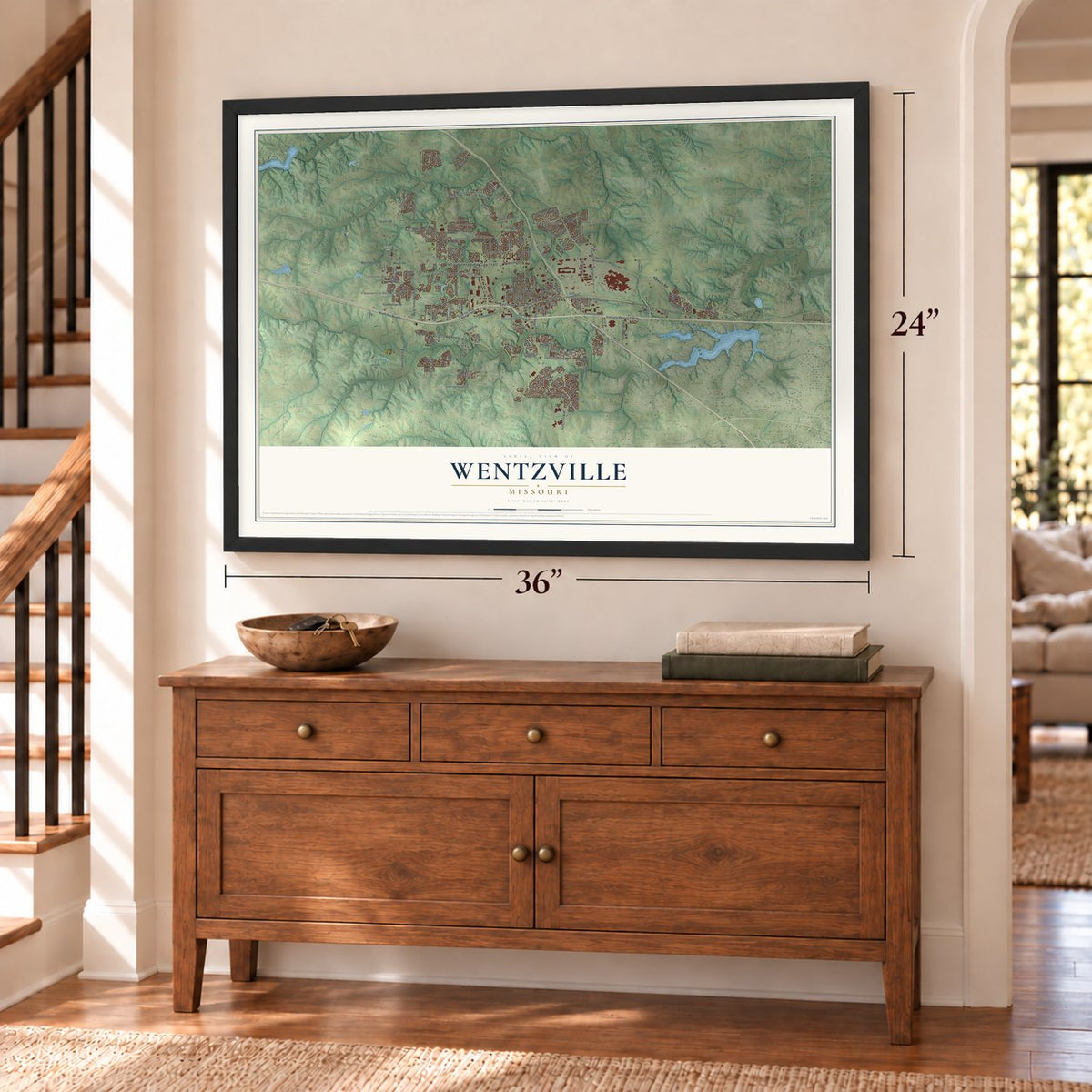 Wentzville, Missouri map, 24 x 36 inch print in a black frame above a dresser by a staircase