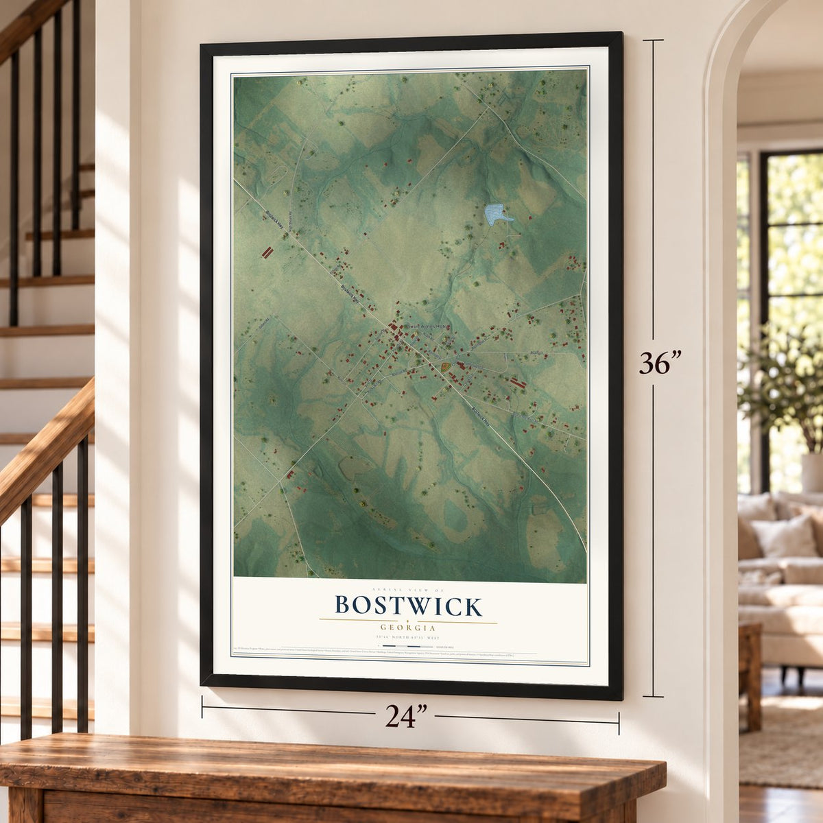 Bostwick, Georgia map, 24 x 36 inch print in a black frame by a staircase