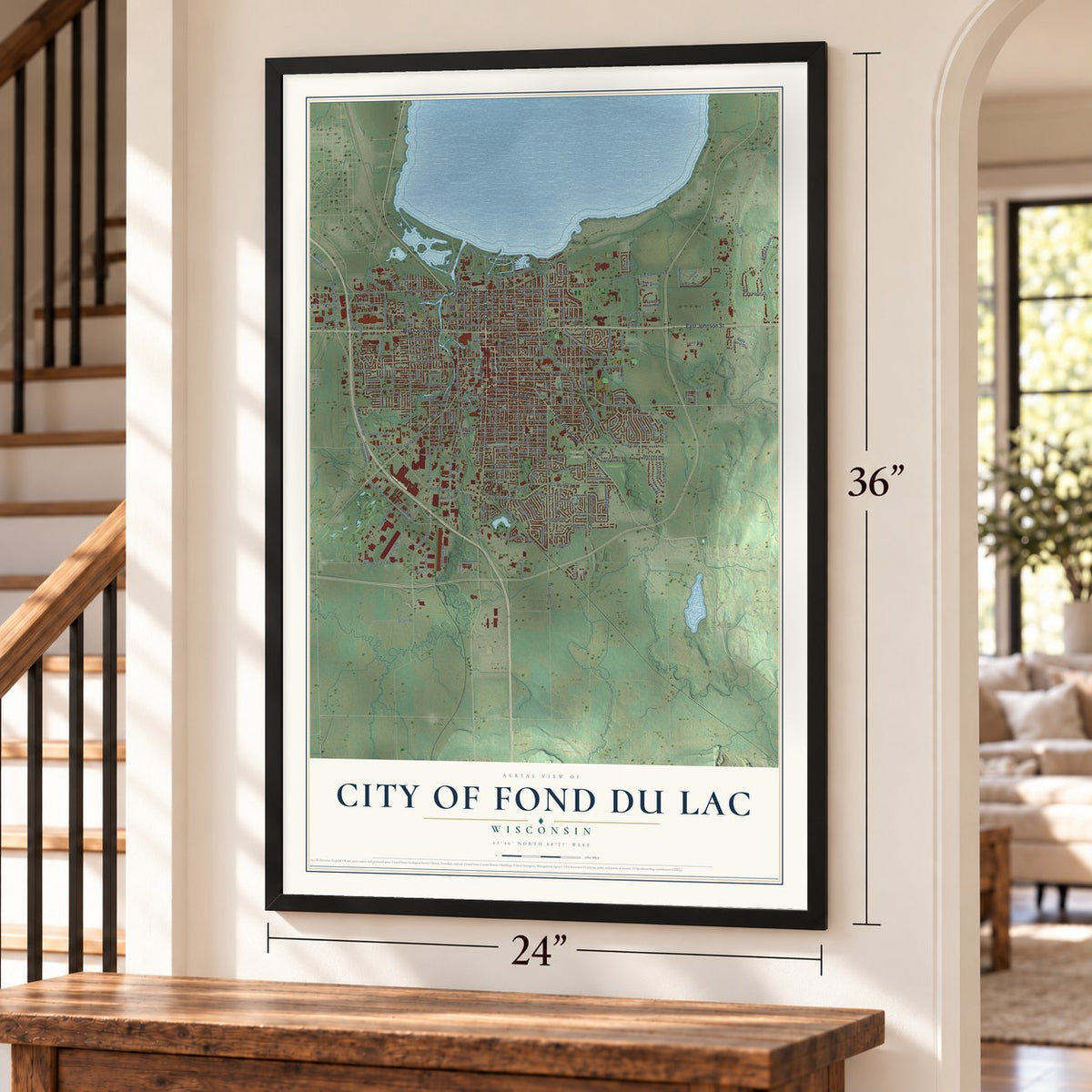 Fond du Lac, Wisconsin map, 24 x 36 inch print in a black frame by a staircase