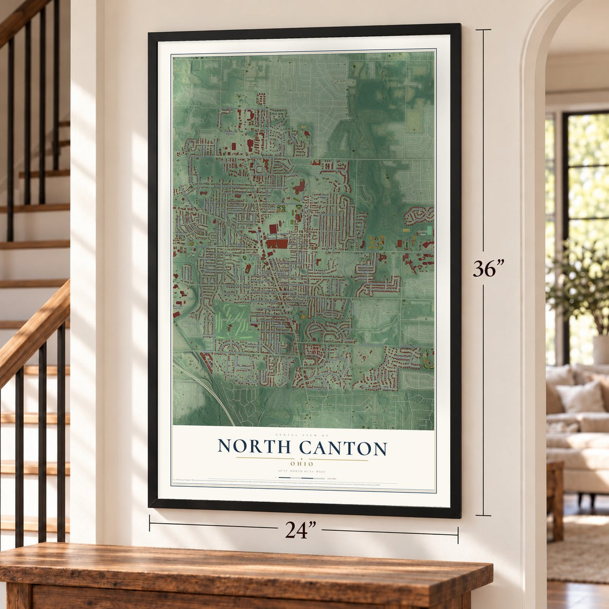 North Canton, Ohio map, 24 x 36 inch print in a black frame by a staircase